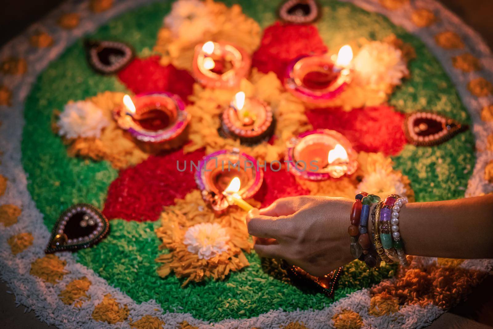 Diwali is a festival of lights celebrations by Hindus , Jains, Sikhs and some Buddhists