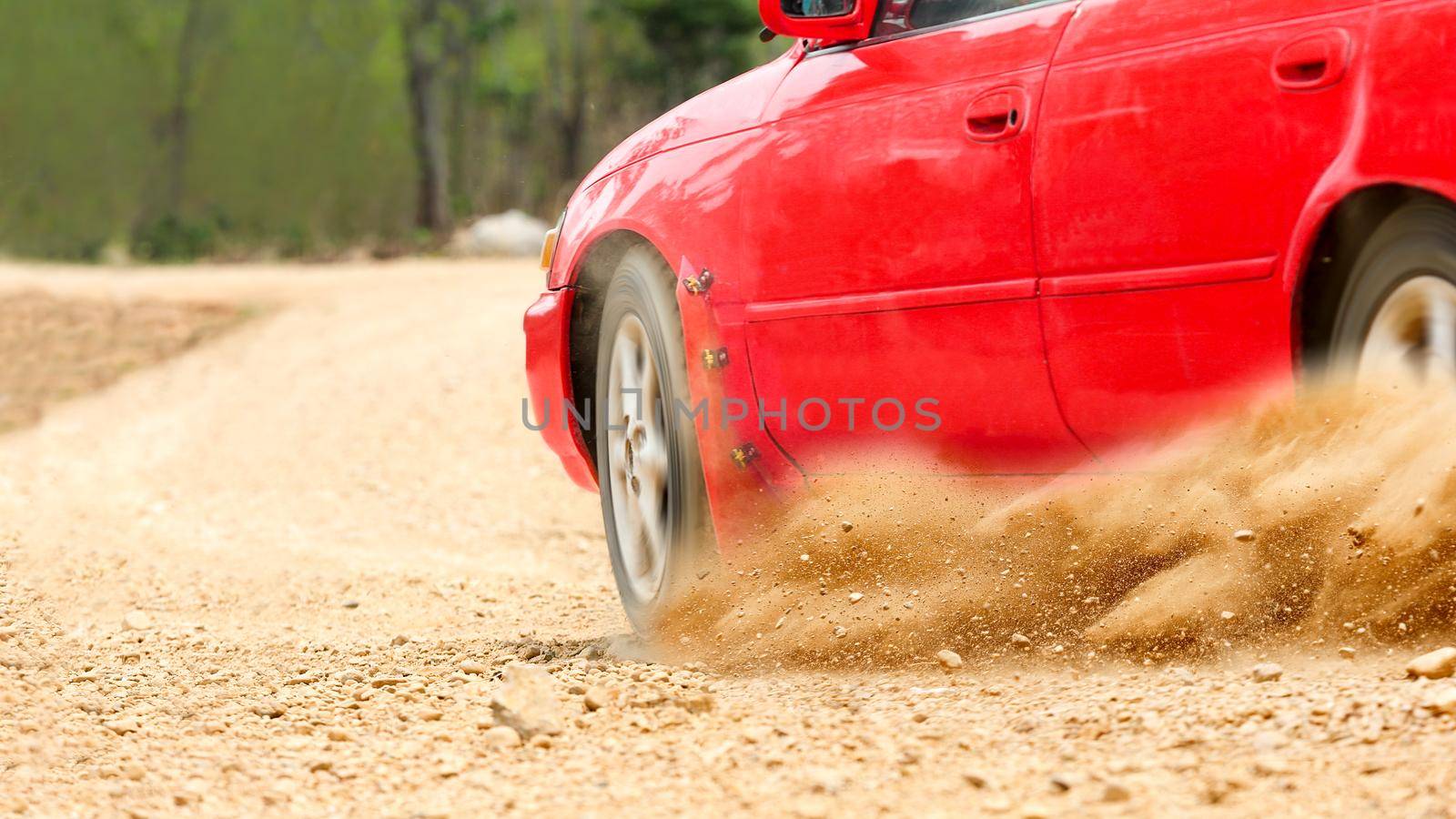 Rally car in dirt track.