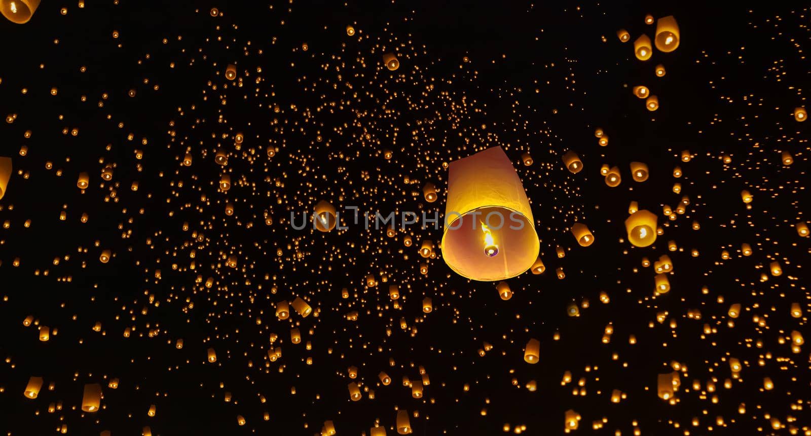 Tourist floating sky lanterns in Loy Krathong festival , Chiang Mai ,Thailand. by toa55