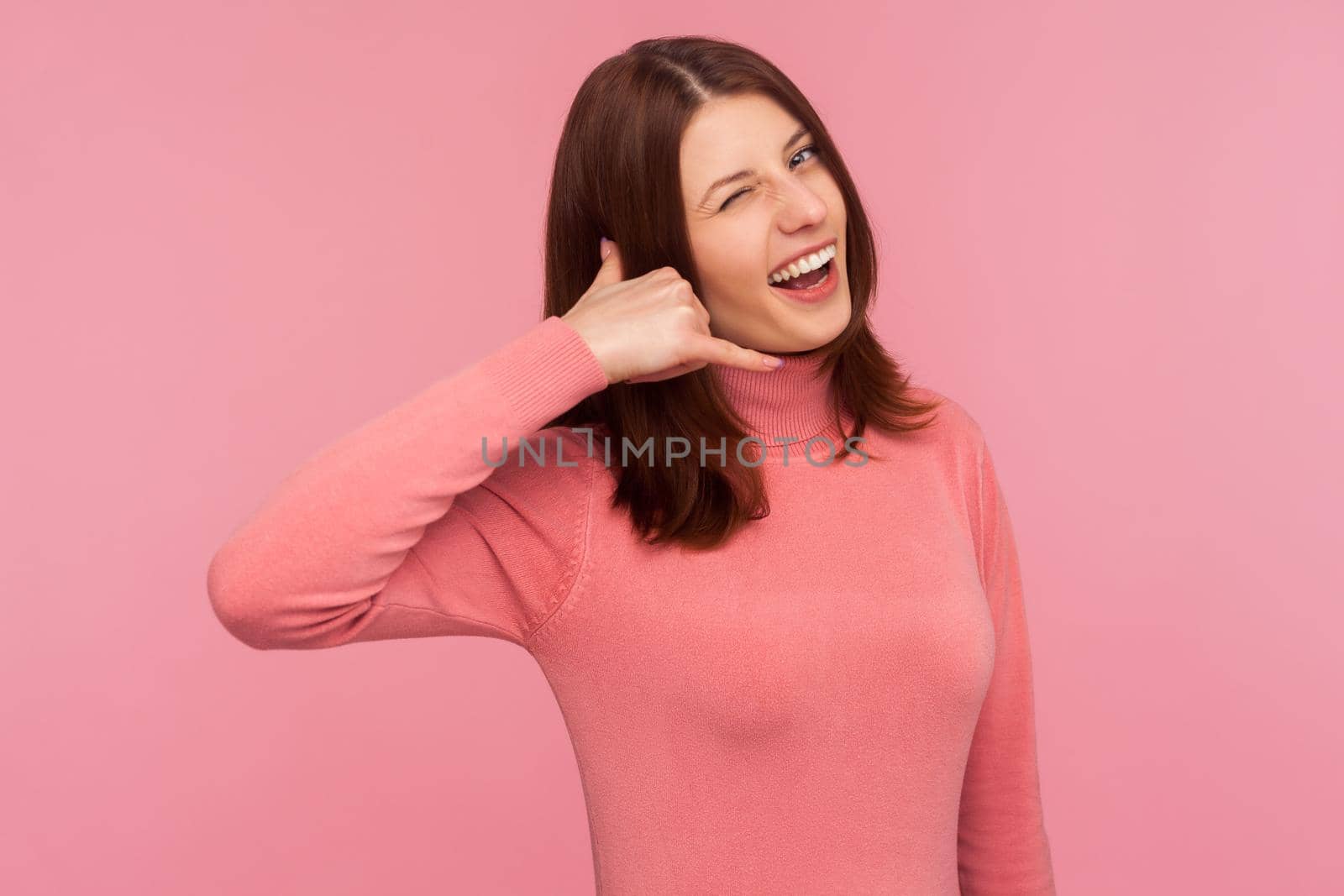 Portrait of emotional brunette young woman on pink background. by Khosro1