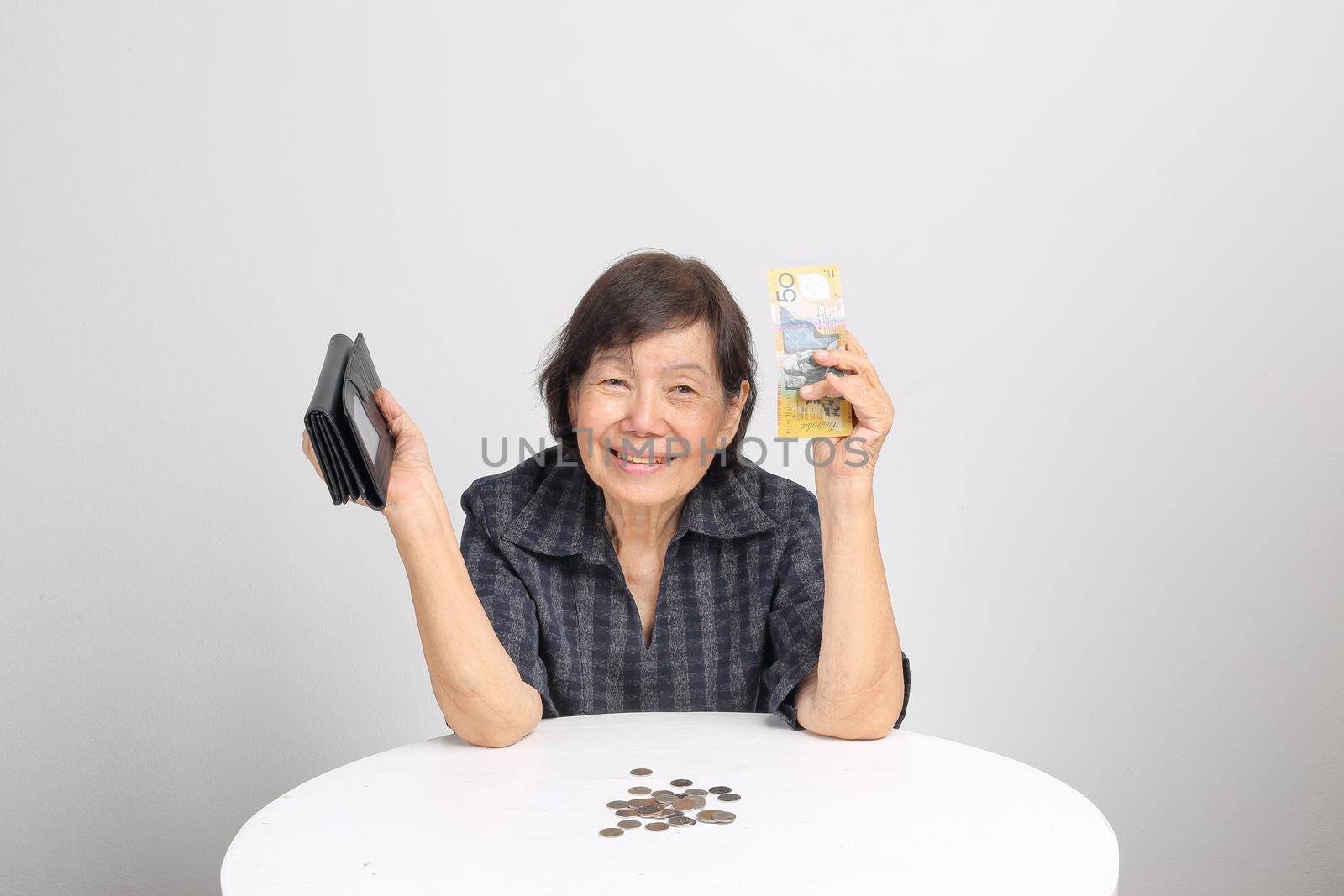 Senior woman counting money