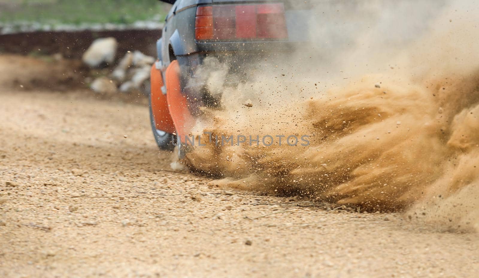 Rally Car turning in dirt track