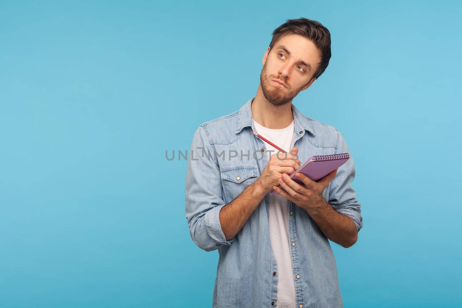 Portrait of young emotional man on blue background. by Khosro1