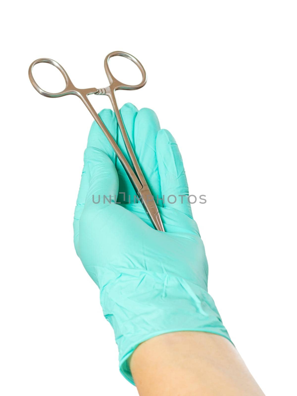 Woman's hand in a latex glove with stainless steel needle holder on the white isolated background.