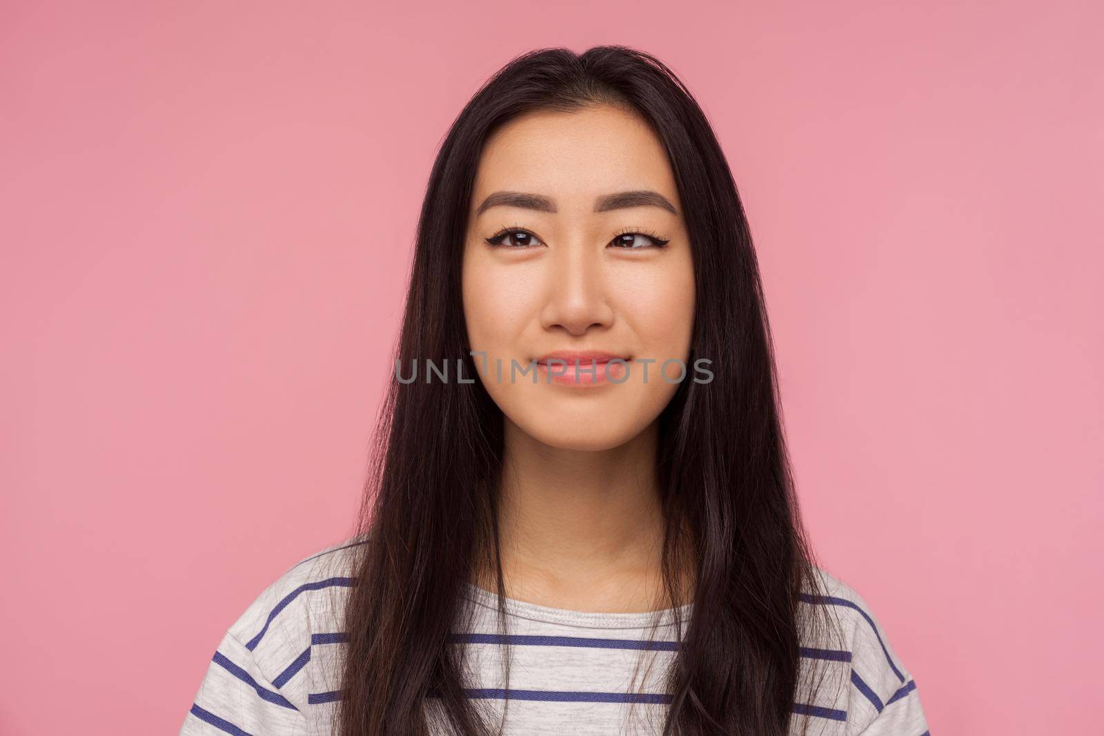 Portrait of asian young woman on pink background. by Khosro1