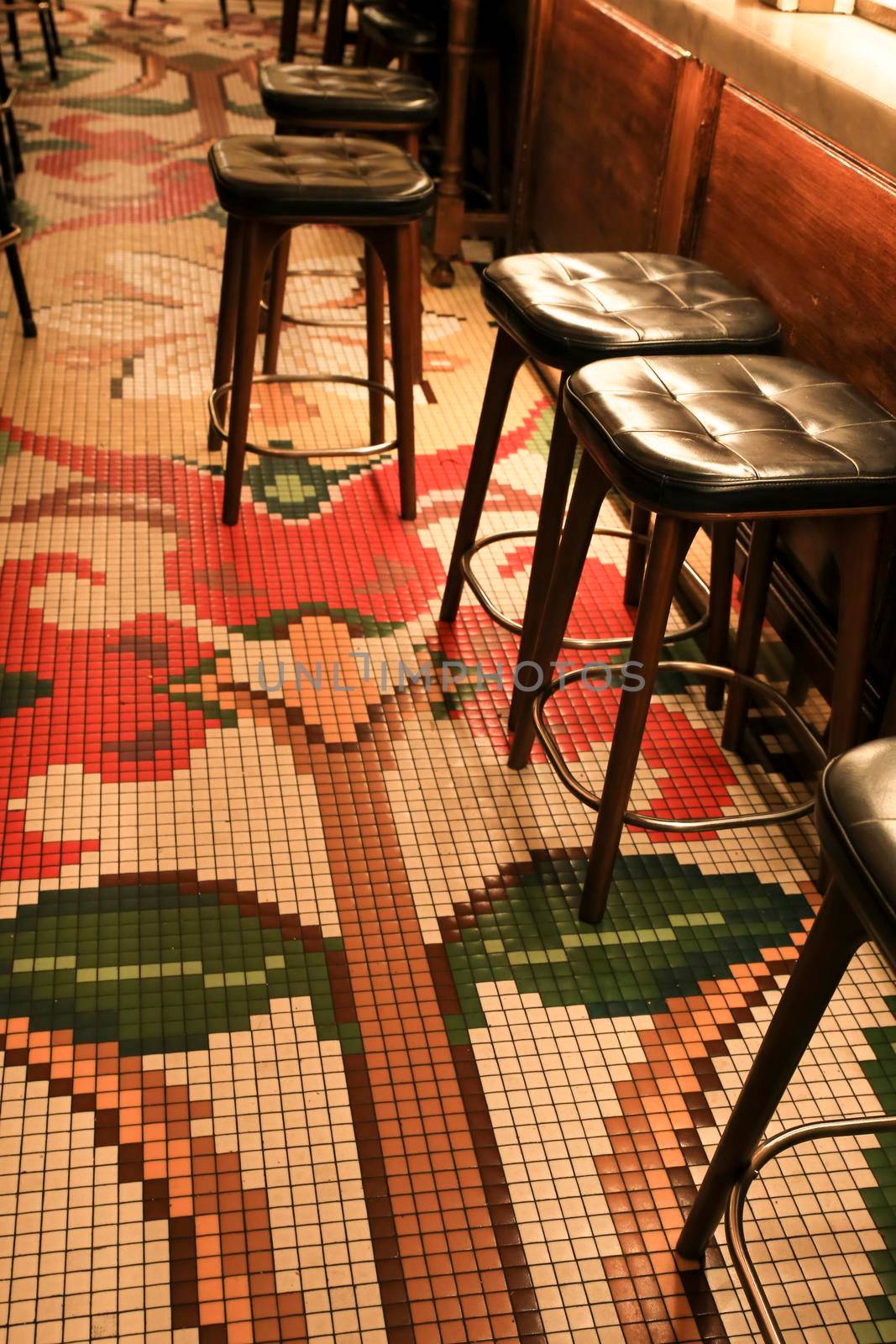 Alicante, Spain- June 26, 2022: Mosaic floor of the Manero bar in Alicante with beautiful colonial style