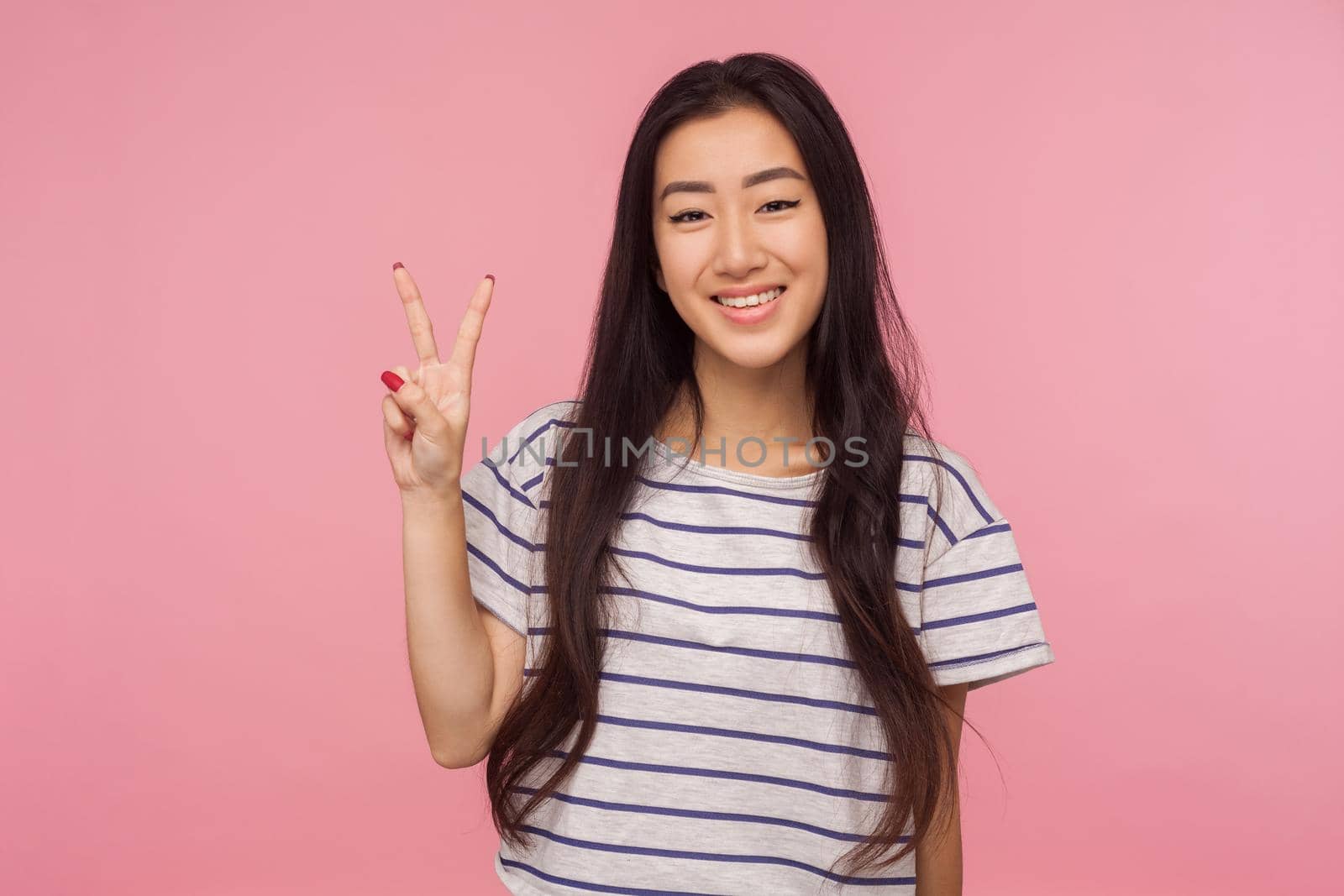 Portrait of asian young woman on pink background. by Khosro1