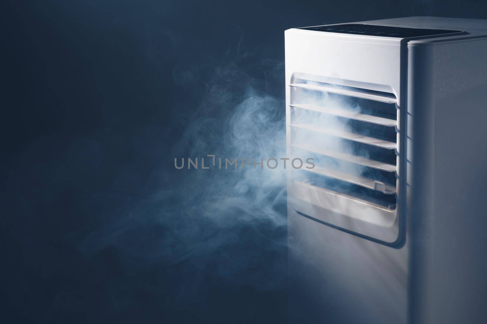 air conditioner louvers outlet with cold steam, close-up view by nikkytok