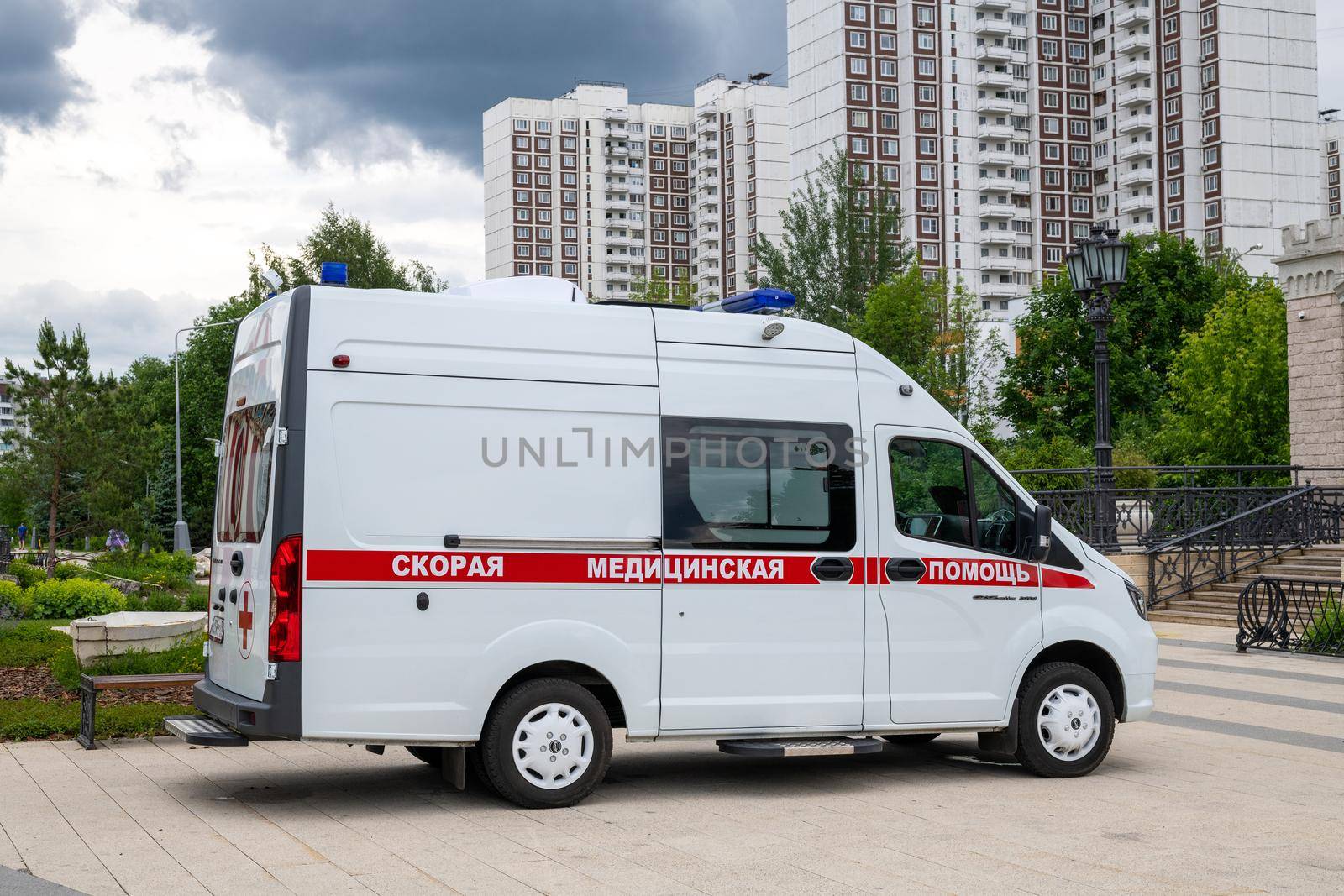 Moscow, Russia - June 17. 2022. An ambulance against the backdrop of residential buildings in Zelenograd
