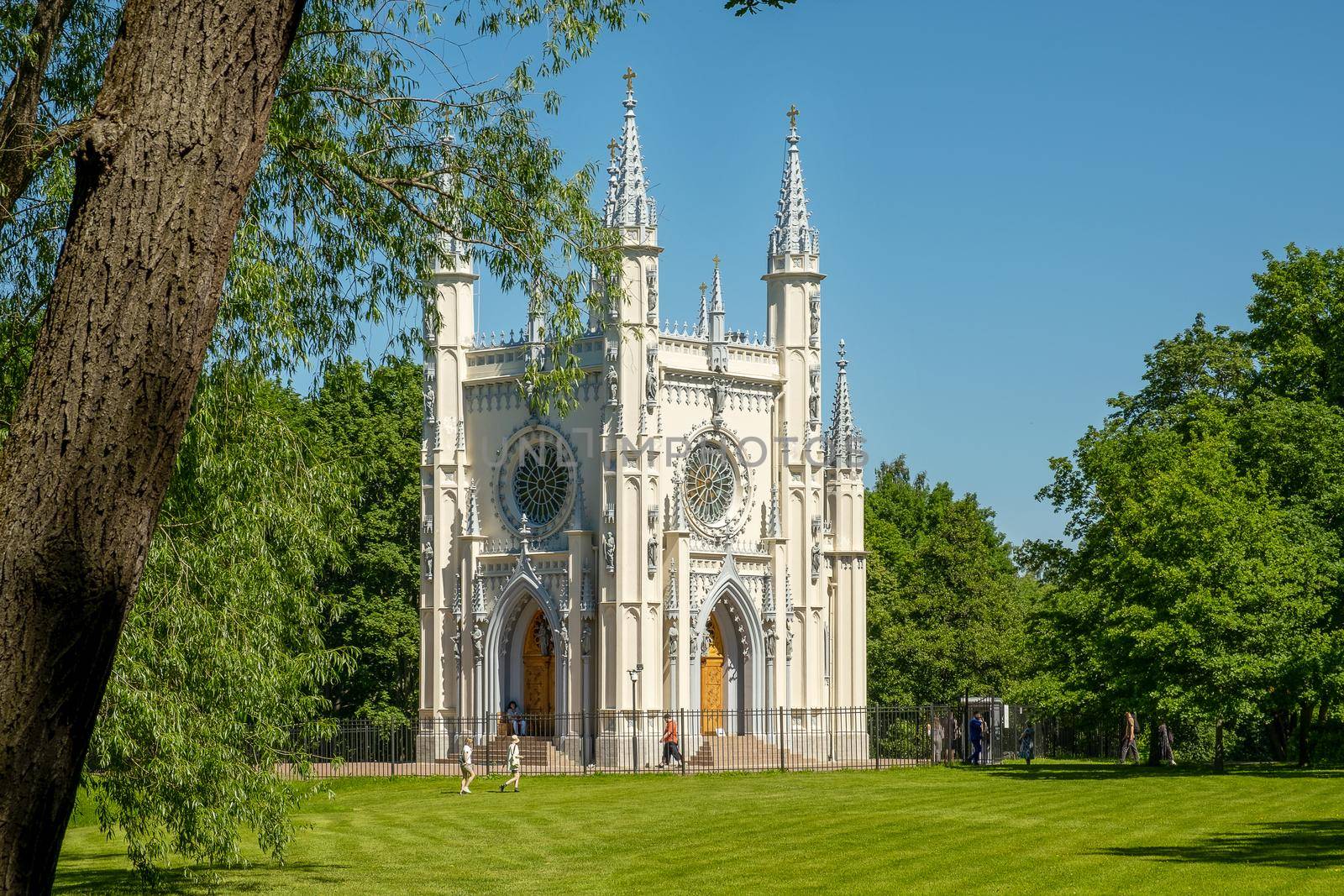 St. Petersburg, Peterhof, Russia - June 25, 2022. Beautiful building of the Gothic chapel in Alexandria park. Historical buildings, architecture. Selective focus.