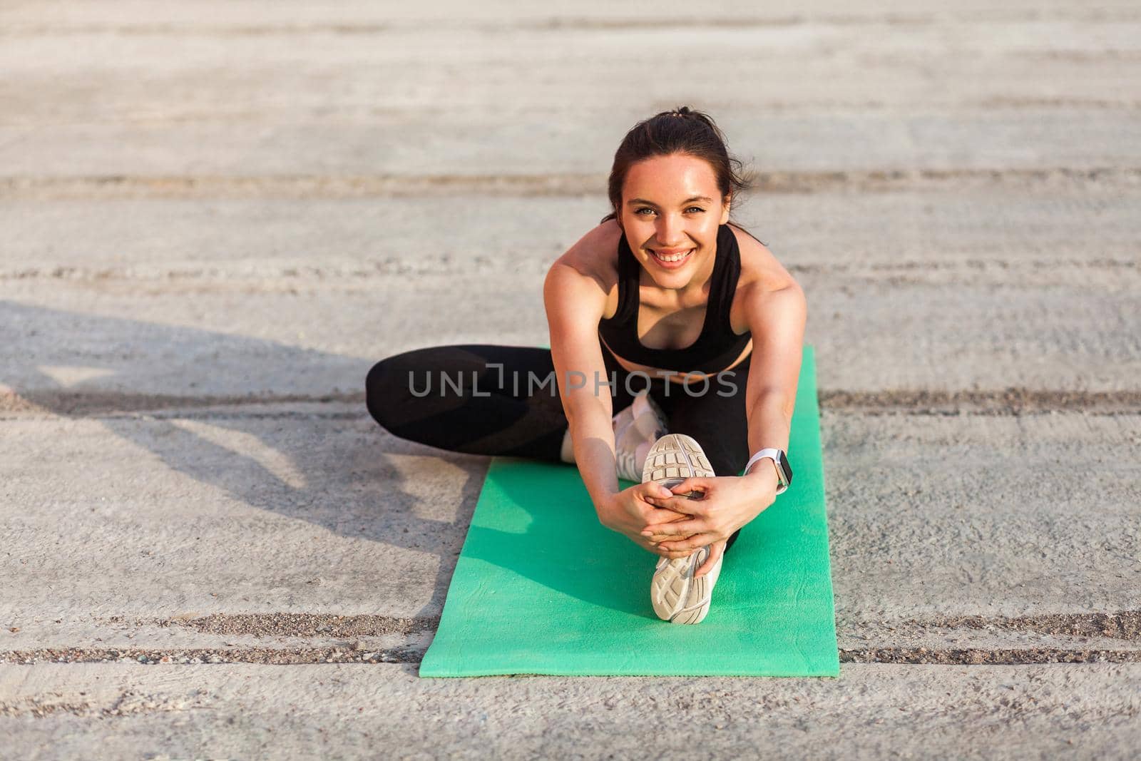 Young brunette woman and sport workout outdoor. by Khosro1