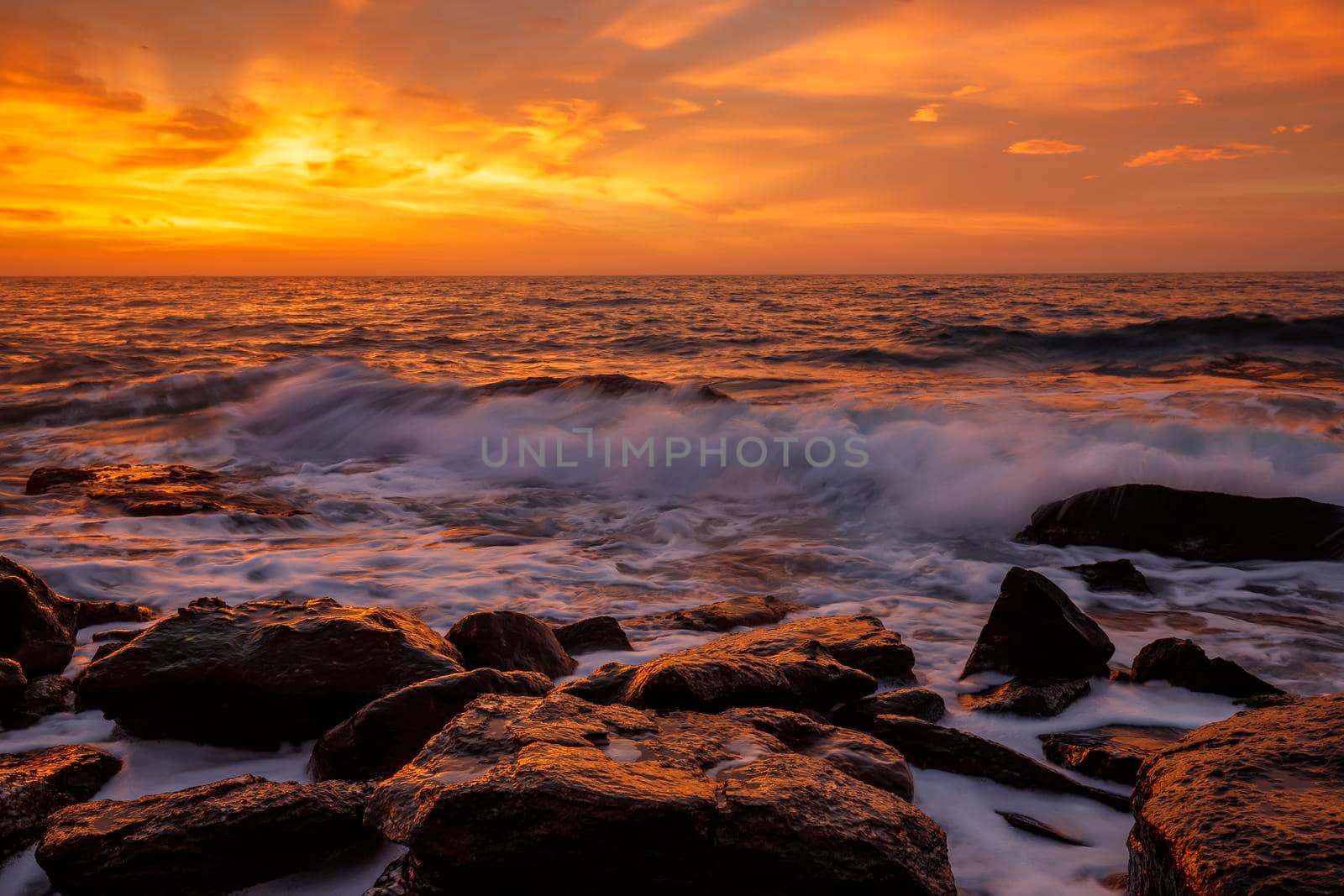 Amazing warm sunrise over the sea. Horizontal view