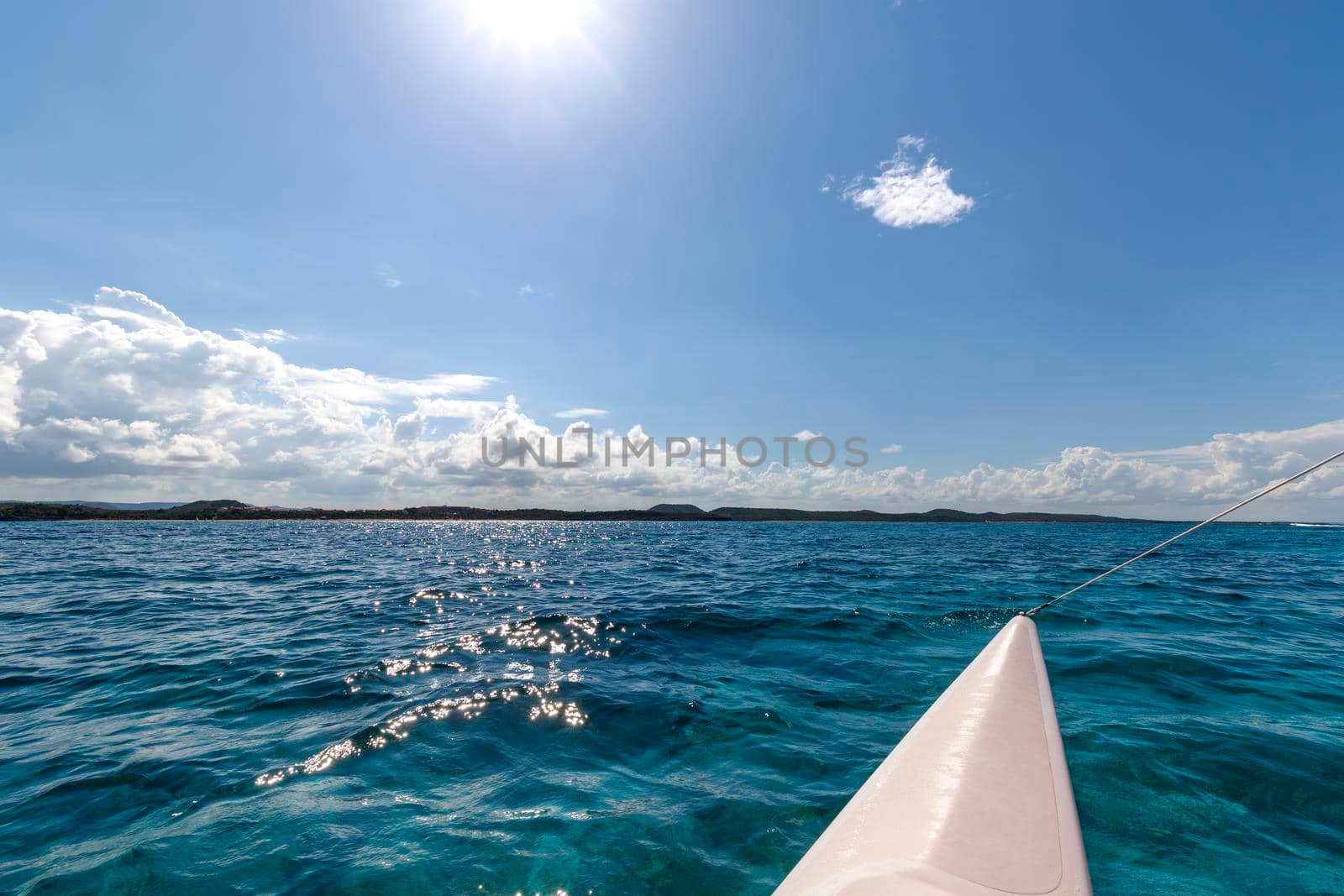 Beautiful landscape from the catamaran to Atlantic ocean and coastline, Turquoise water and blue sky with clouds. Cuba