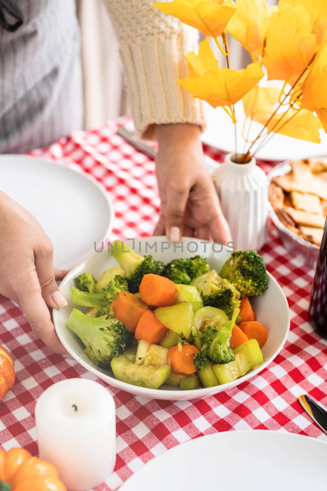 Happy Thanksgiving Day. Autumn feast. Woman celebrating holiday cooking traditional dinner at kitchen