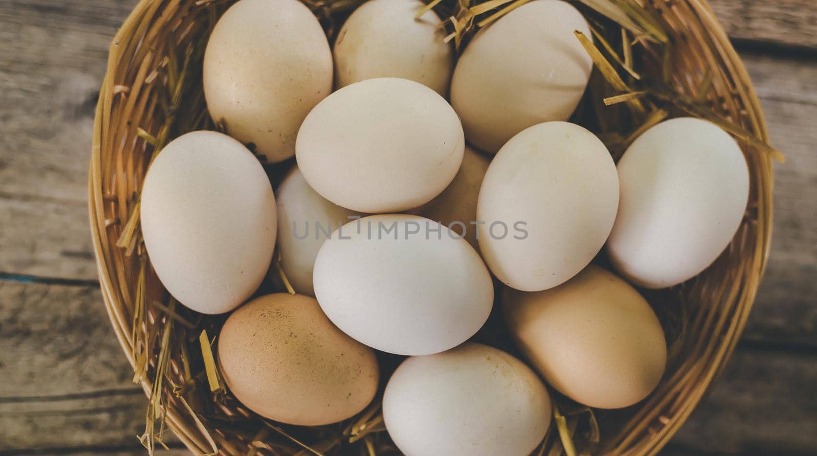 Homemade chicken eggs in a basket. Selective focus. nature.