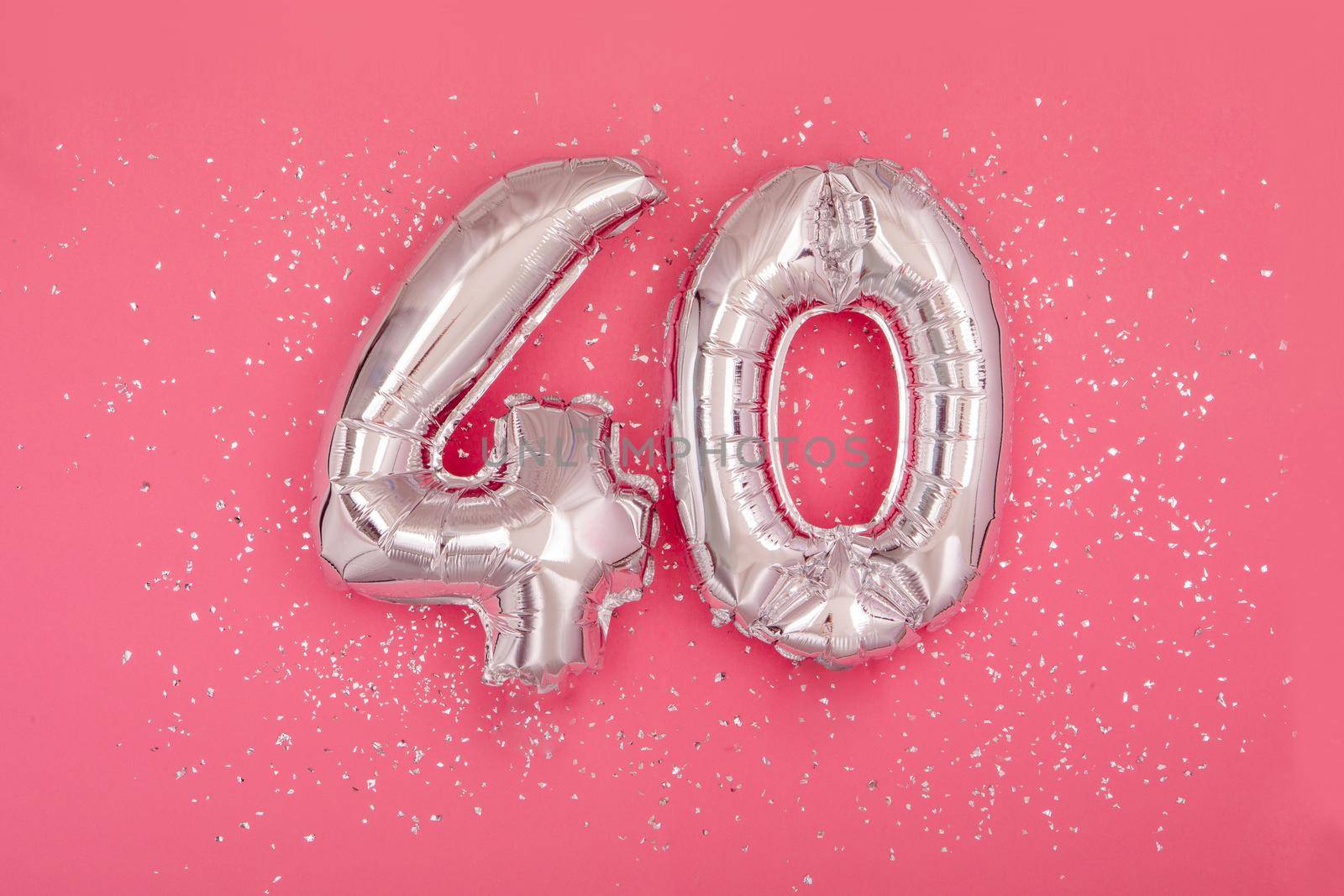 Silver balloon in shape of number fourty 40 pink background by Demkat