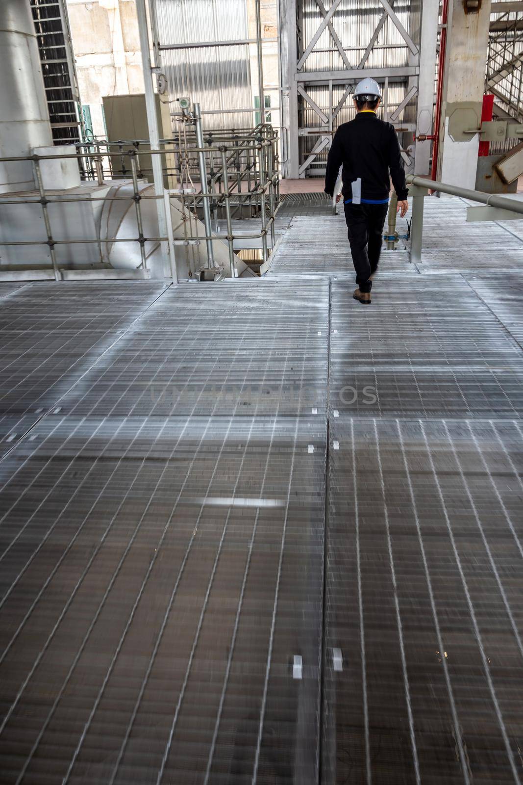 Metal grating walkway on the mill by Satakorn