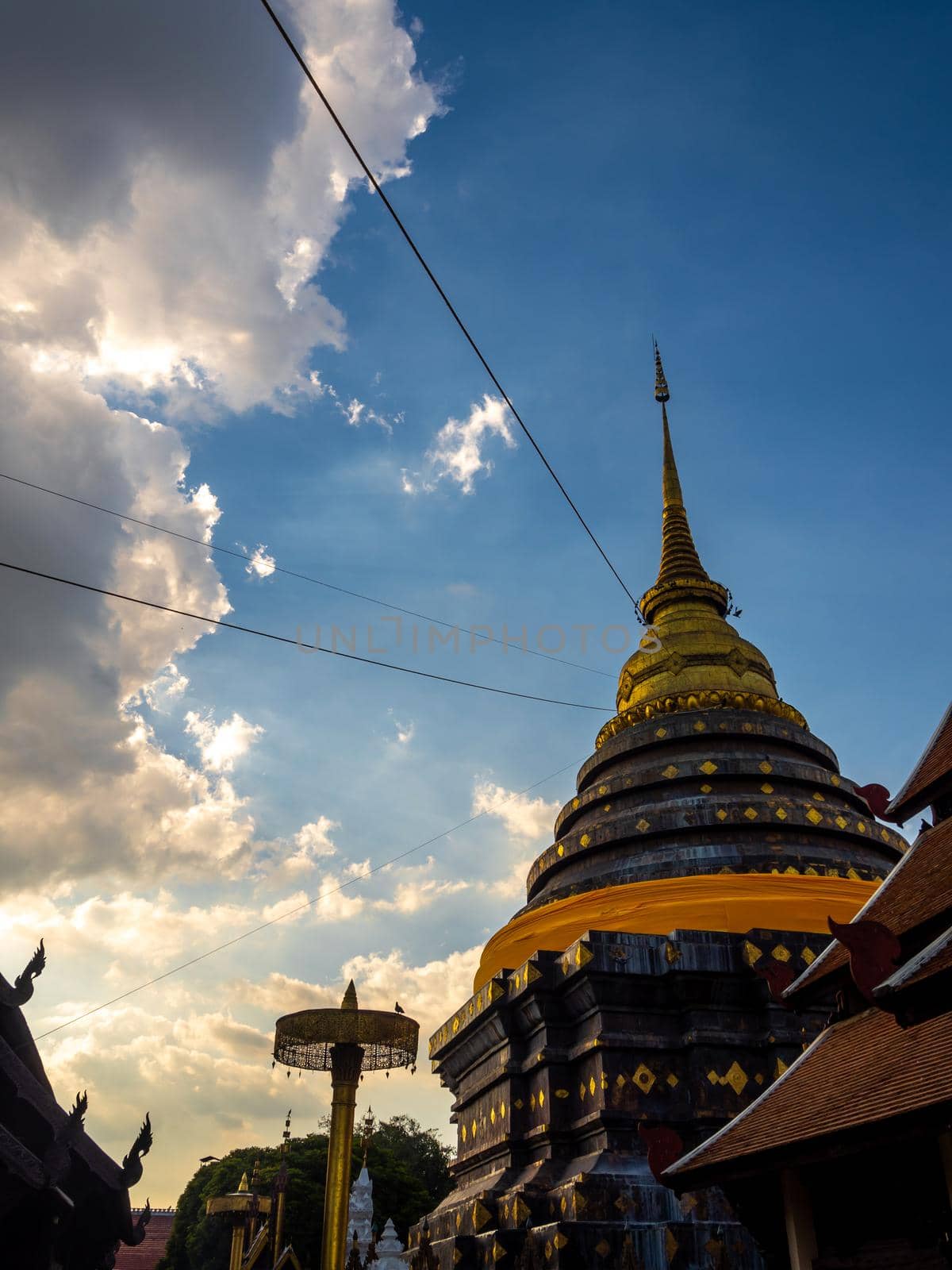 Northern Thai art patterns on various parts of the chapel and pagoda in the temple