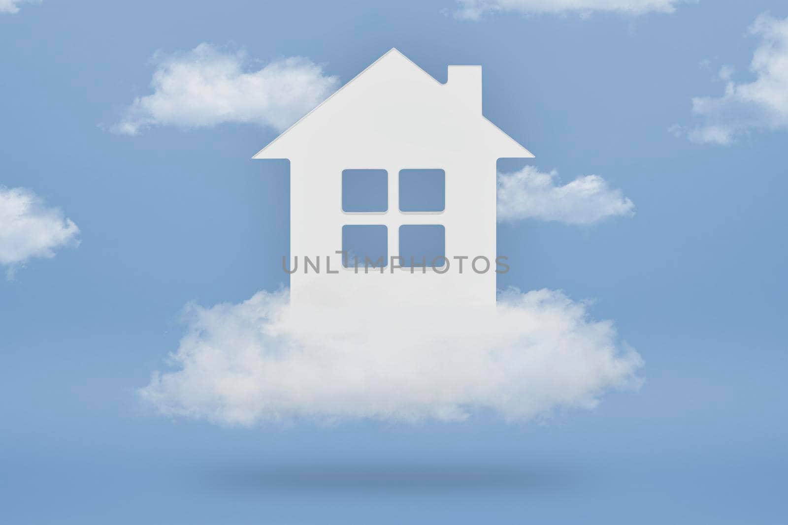 Dream House. The concept of buying a dream home. White house in the clouds on a blue sky background. Purchase of real estate, real estate loan