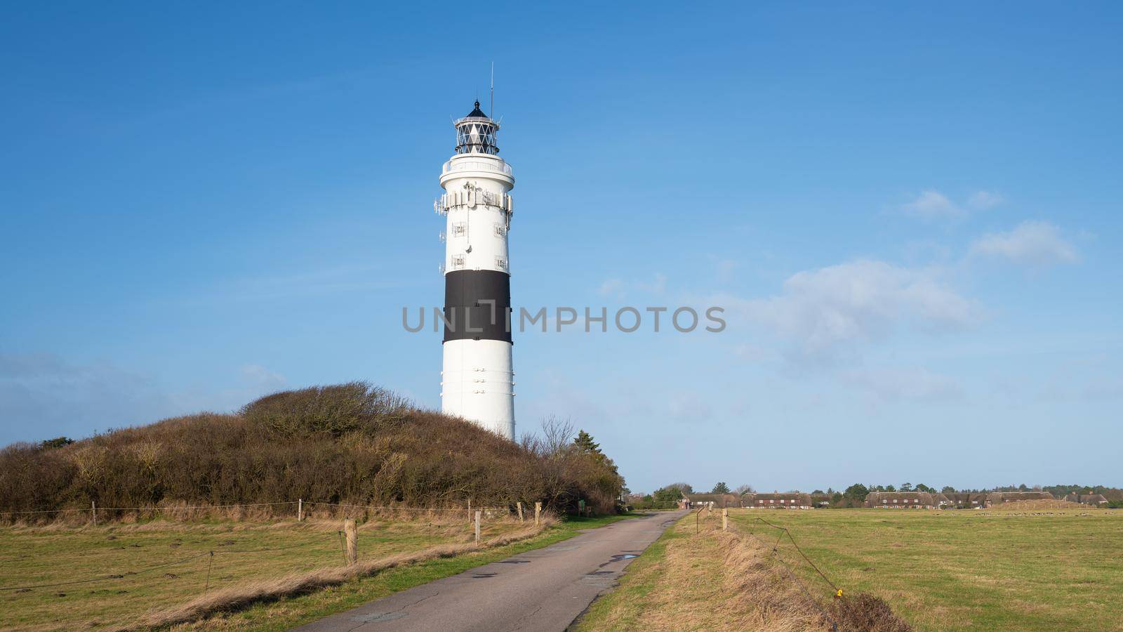 Panoramic image of Kampen lighthouse against sky, Sylt, North Frisia, Germany 