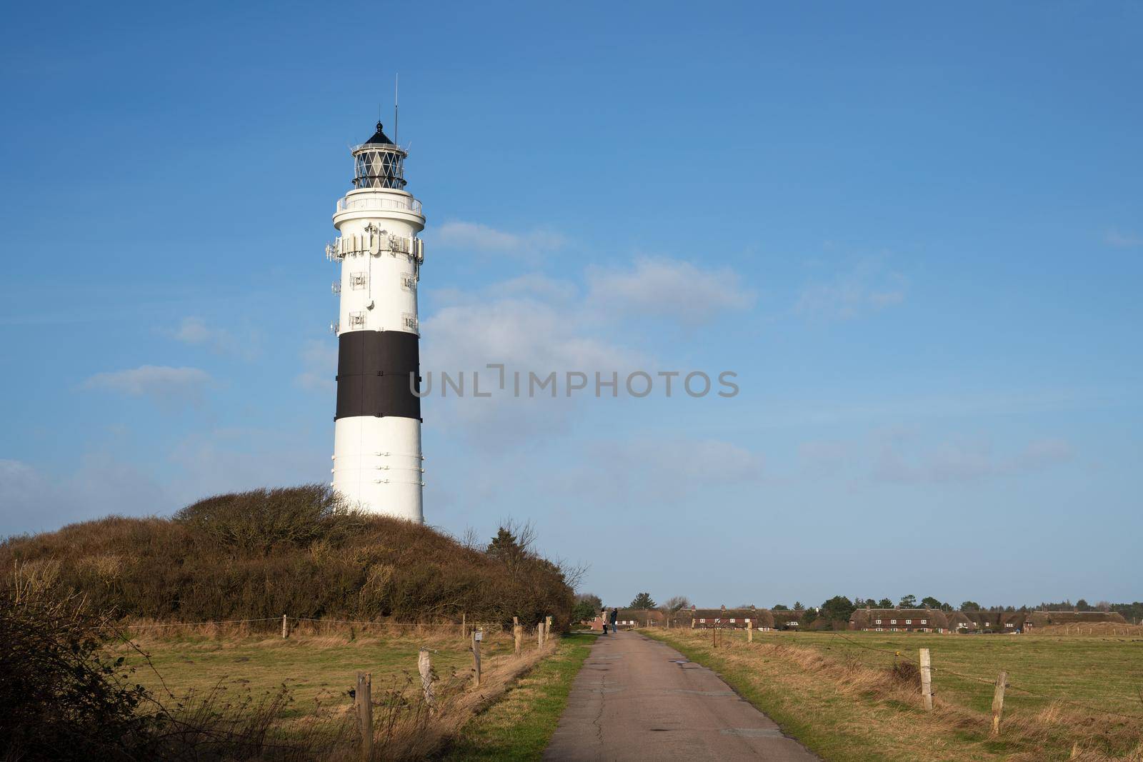 Panoramic image of Kampen lighthouse against sky, Sylt, North Frisia, Germany 