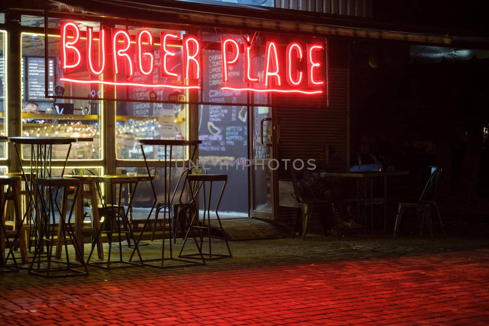 burger place, restaurant sign in red neon letters, Copy free space for logo, text by igor010