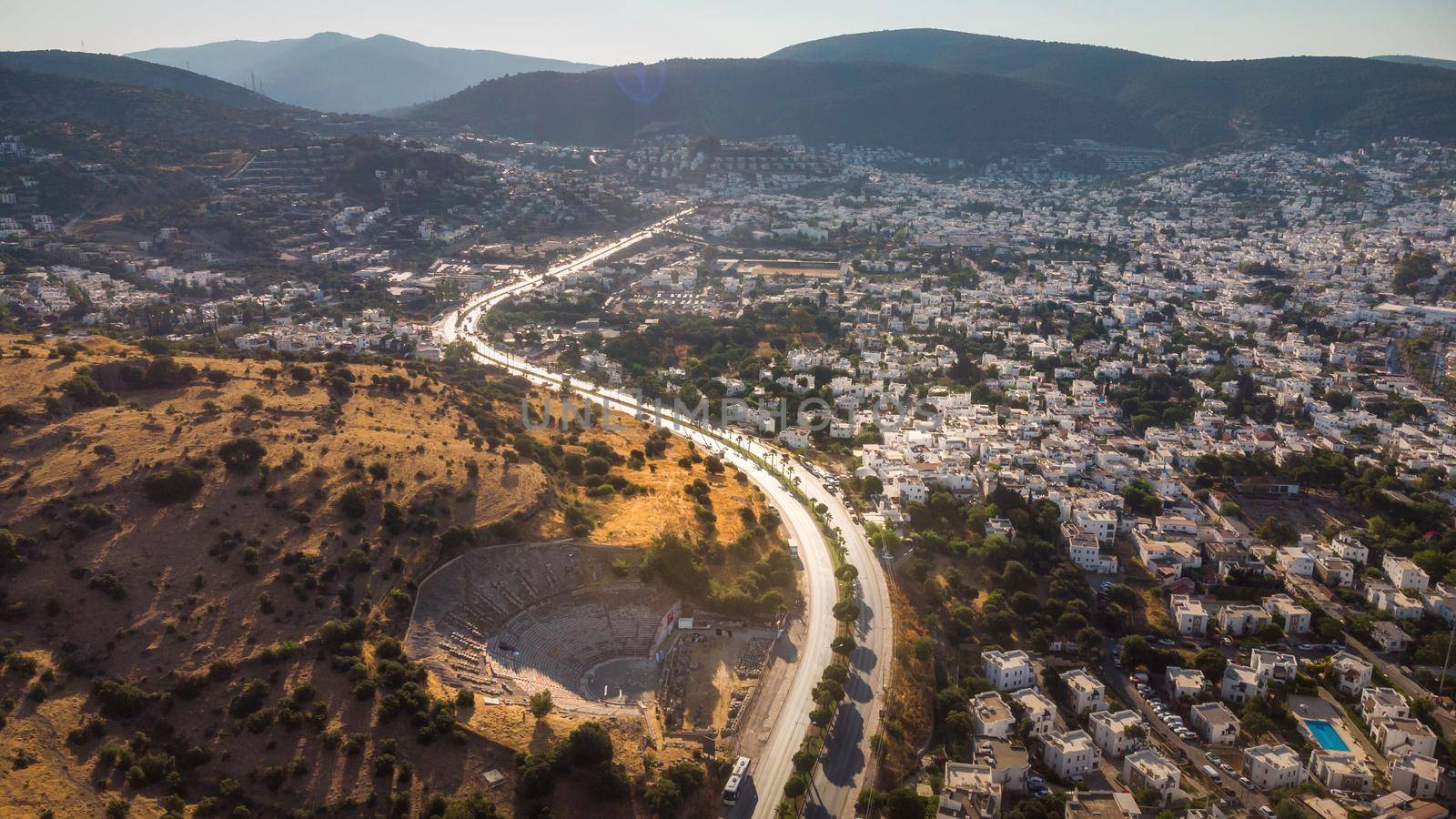 nature mountain view with a road side and old city. Travelling lifestyle roadtrip adventure old Europe. High quality photo