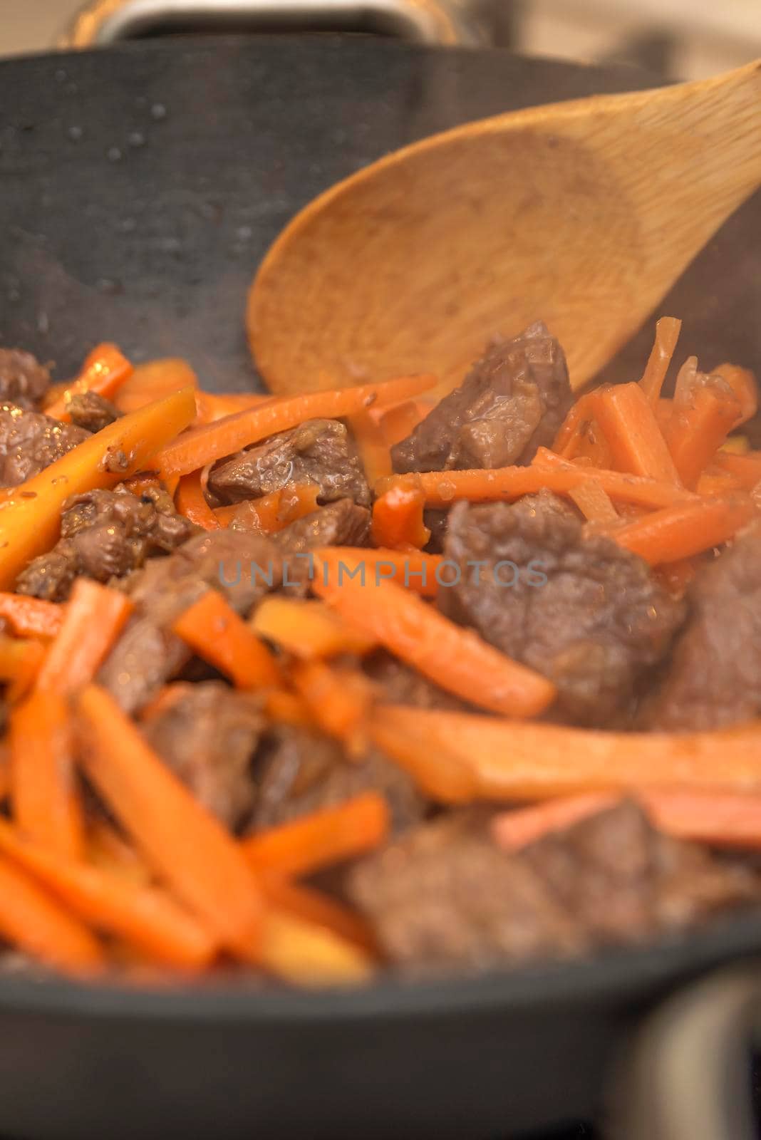 Cooking pilaf in a cauldron. A step by step recipe for cooking pilaf, cut the beef into pieces and fry in a cauldron, meat for pilaf.Cooking pilaf at home.