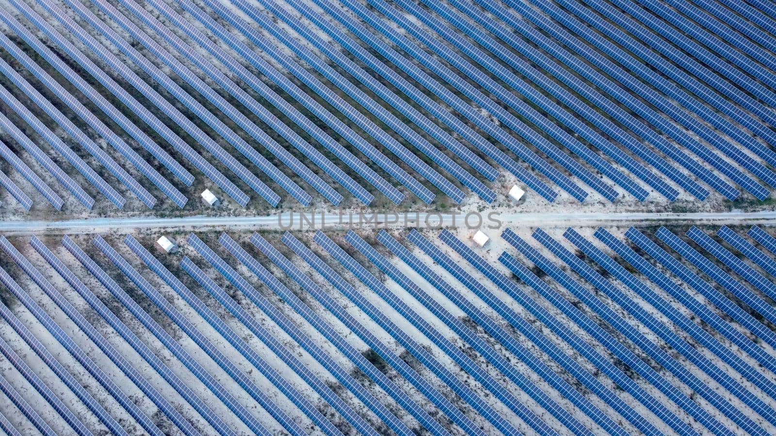 Solar panel with road middle, view from top. solar panels