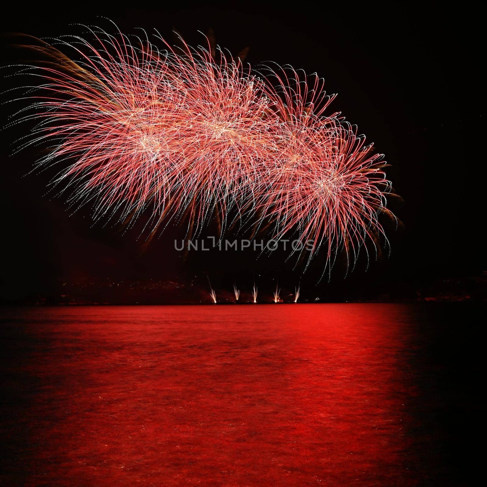 Beautiful colorful fireworks over the water. International fireworks competition Brno - Czech Republic.