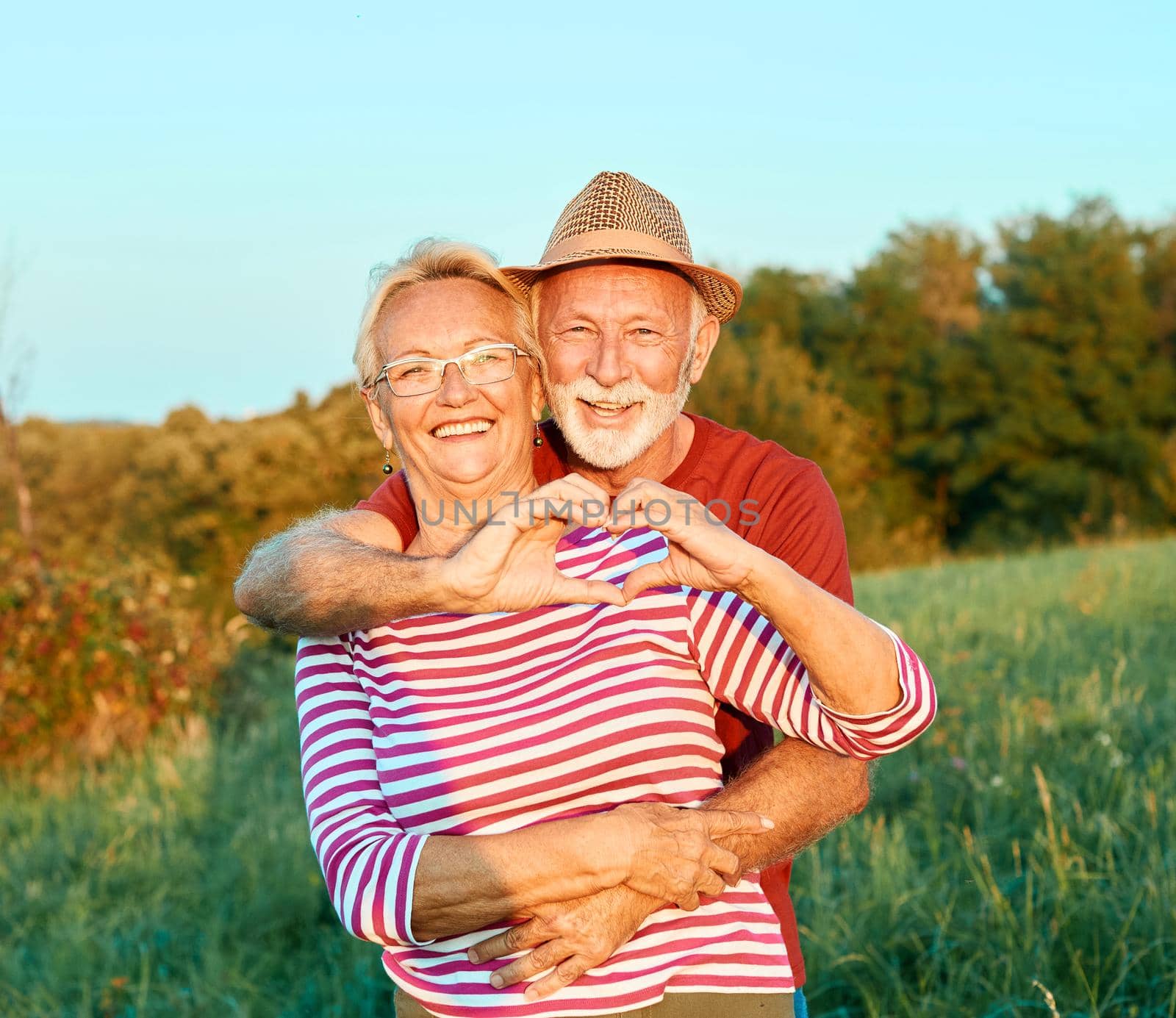 woman man outdoor senior couple happy lifestyle retirement together smiling love old nature mature by Picsfive