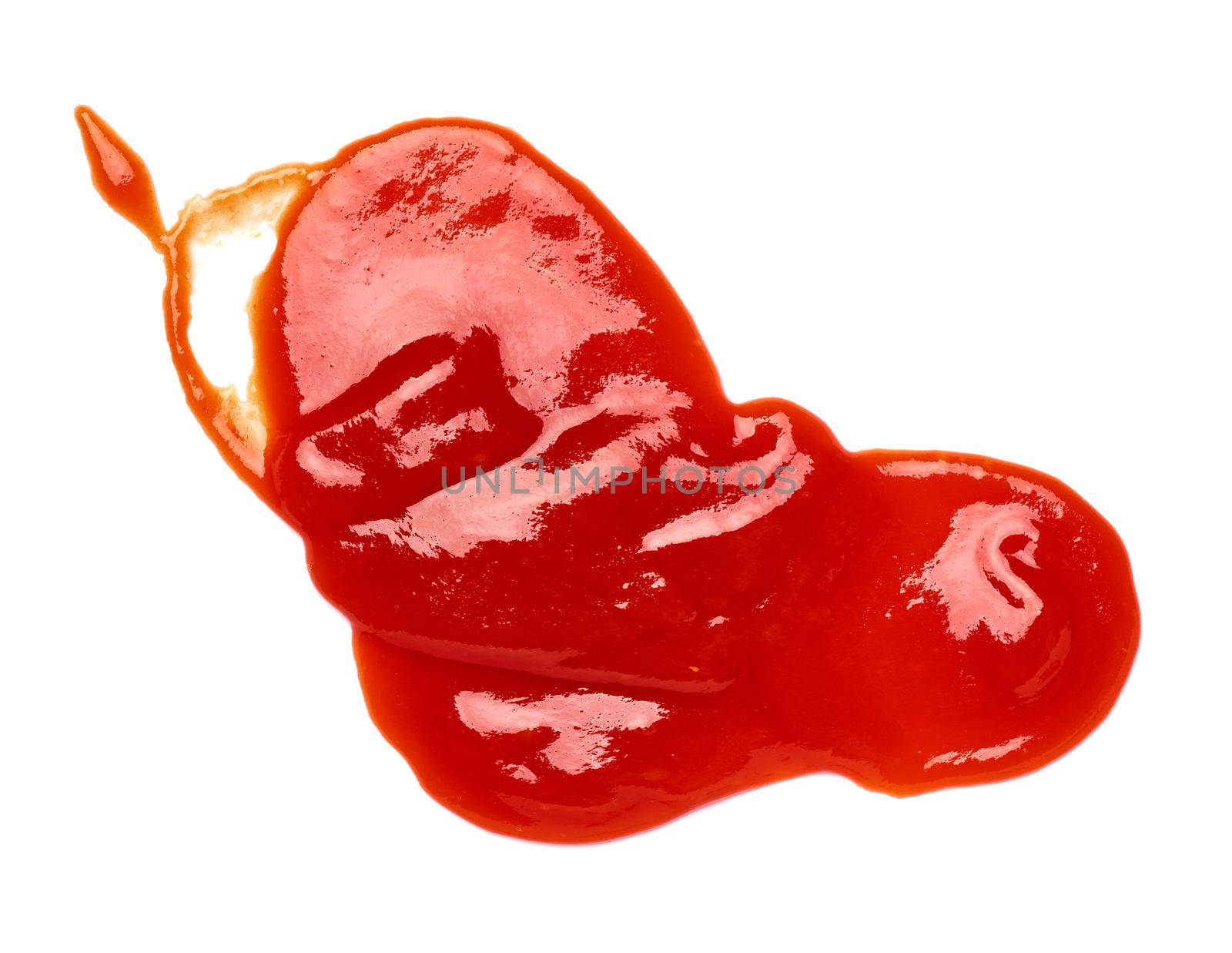 close up of a ketchup stain on white background