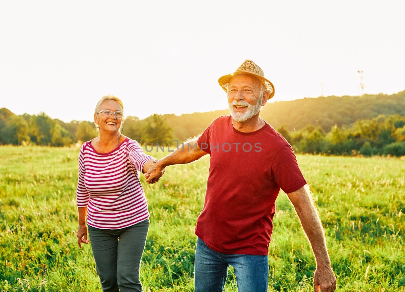 Happy active senior couple outdoors