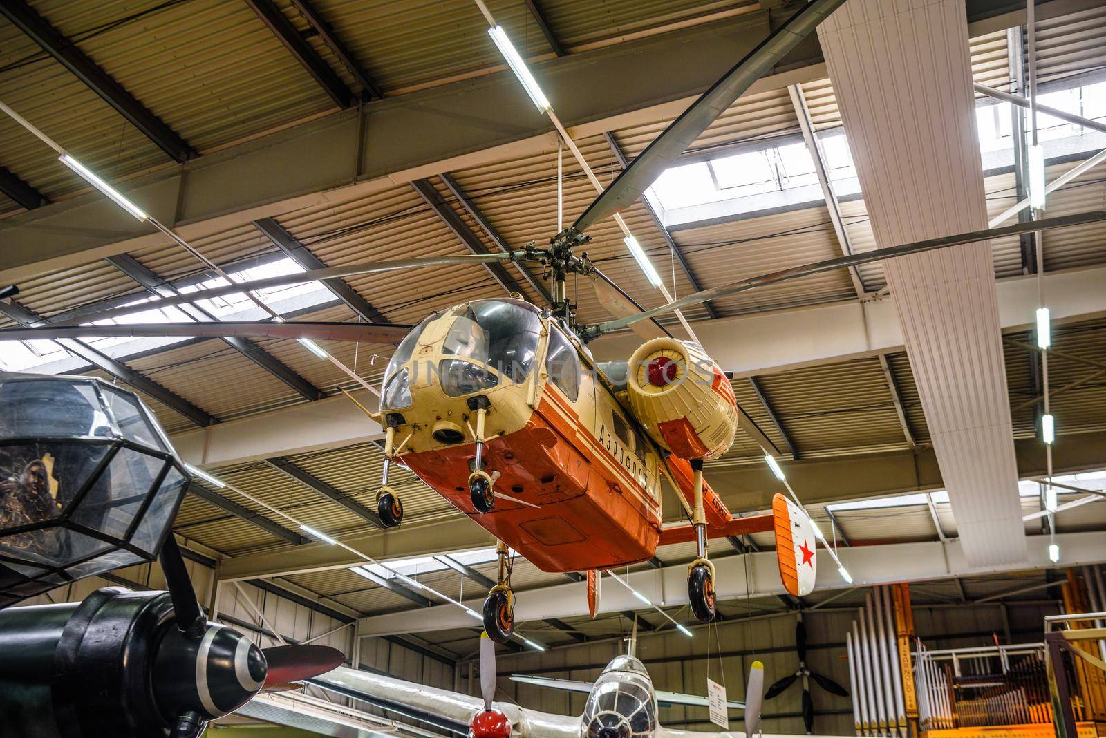 SINSHEIM, GERMANY - MAI 2022: beige orange Soviet light utility helicopter Kamov Ka-26 Hoodlum 1965