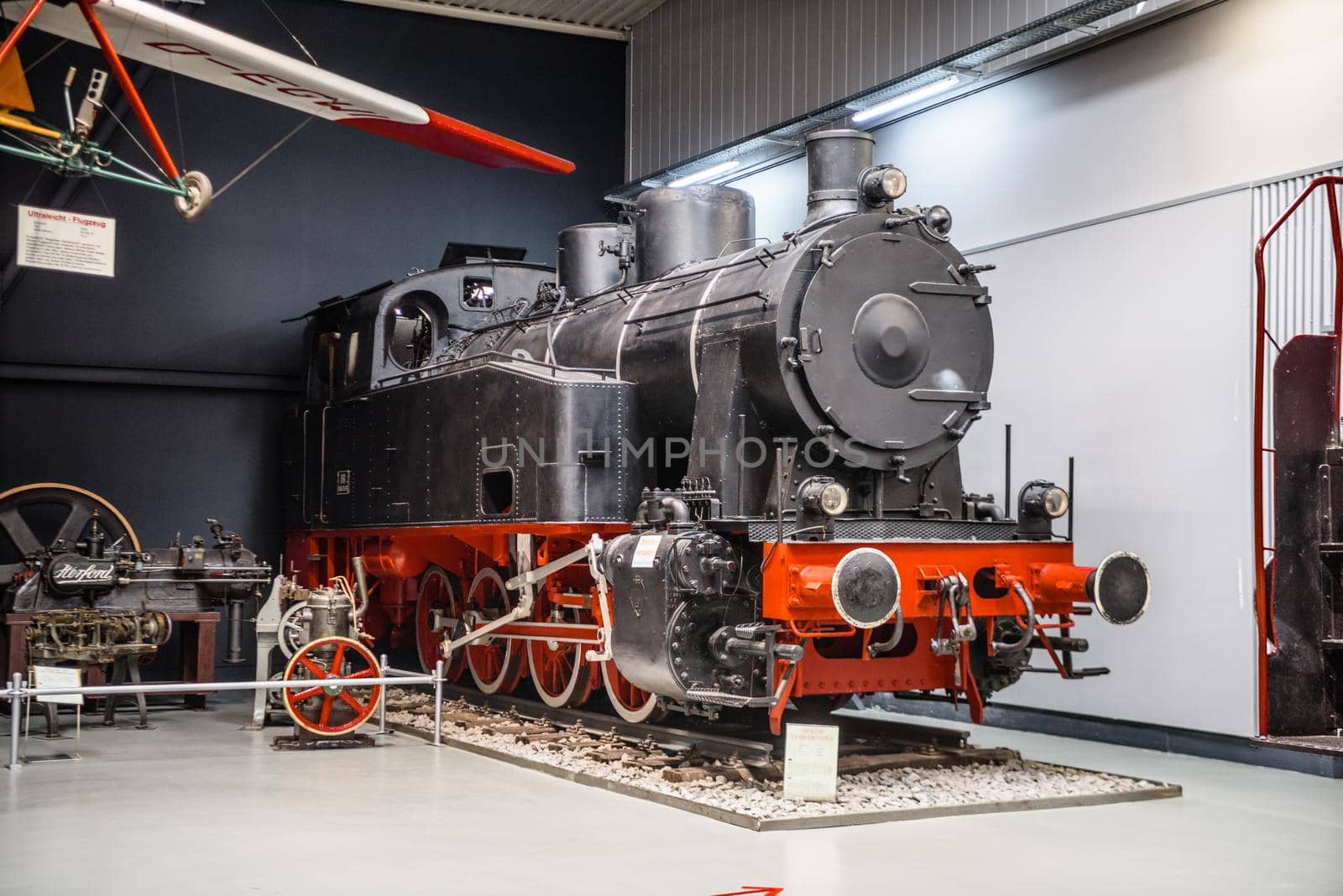SINSHEIM, GERMANY - MAI 2022: black red steam locomotive.