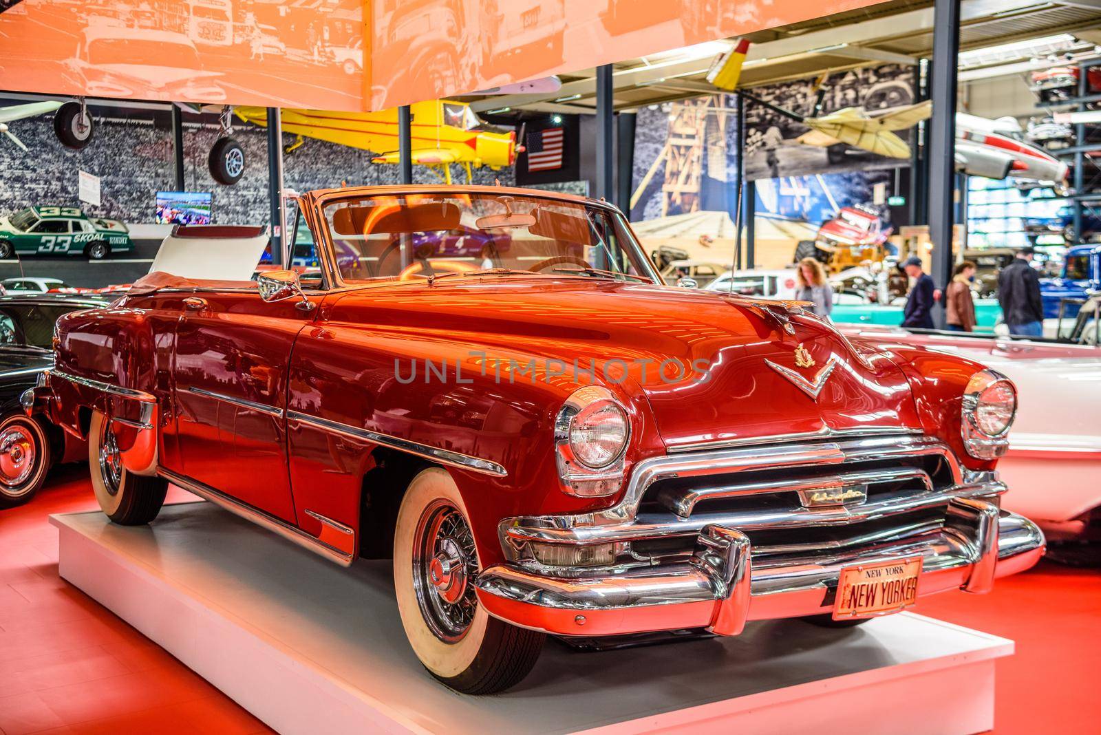 SINSHEIM, GERMANY - MAI 2022: red cabrio Chrysler New Yorker De Luxe Convertible 1954 235ps