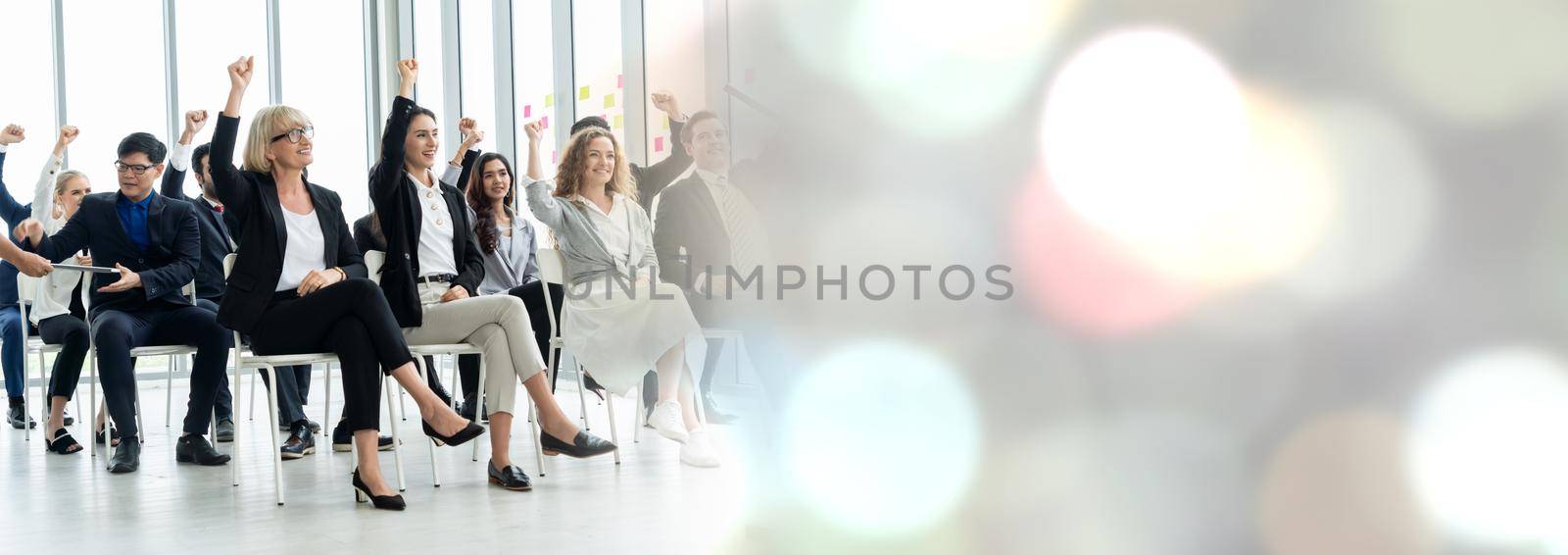 Group of business people meeting in a seminar conference widen view by biancoblue