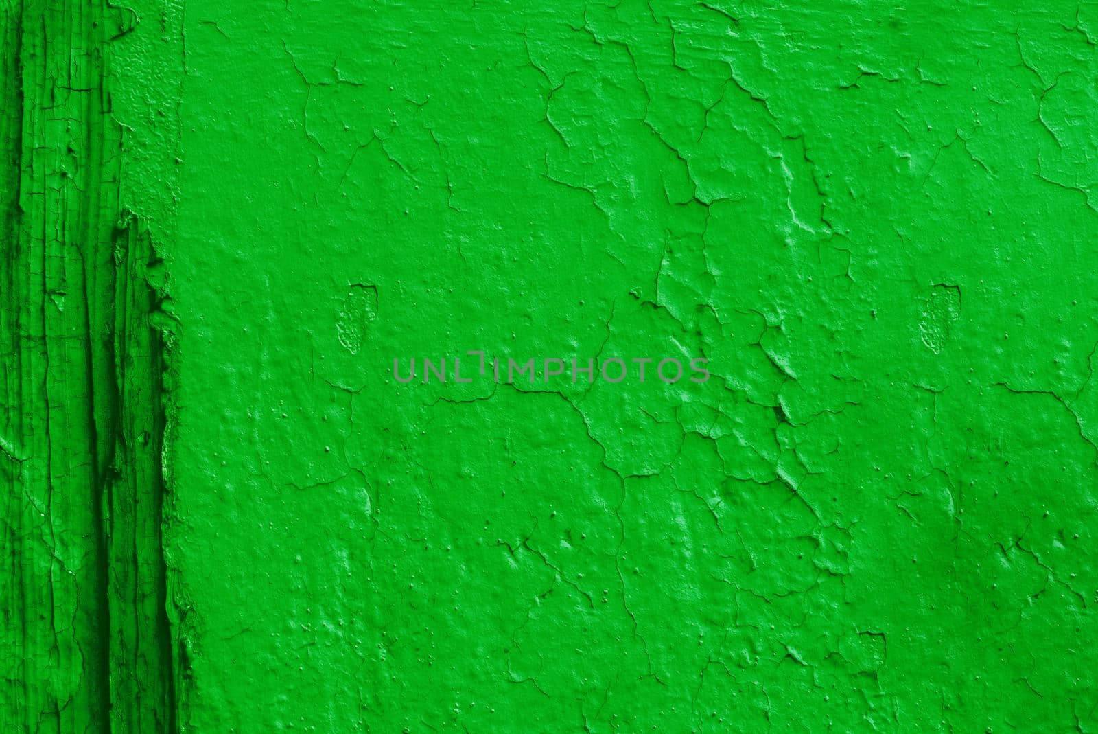 Abstract texture on the wall from old green paint.