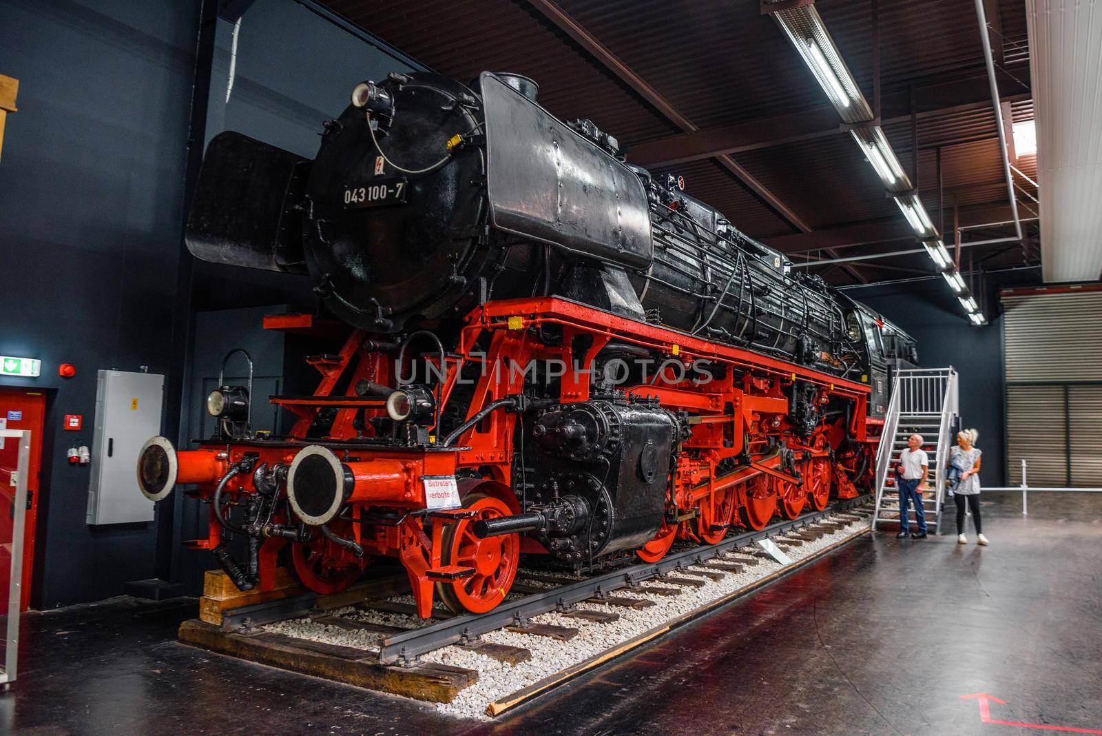 SINSHEIM, GERMANY - MAI 2022: black red antique retro steam locomotive.