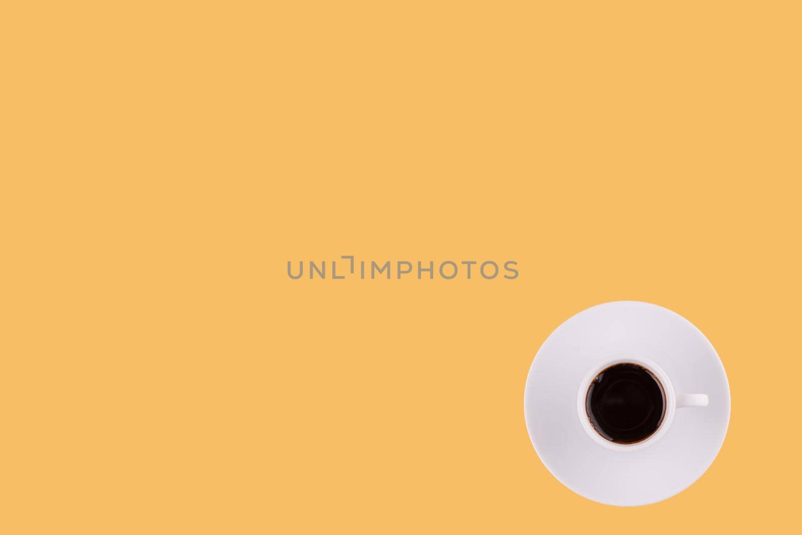 classic cup of americano coffee on a yellow background. Space for text by Iryna_Melnyk