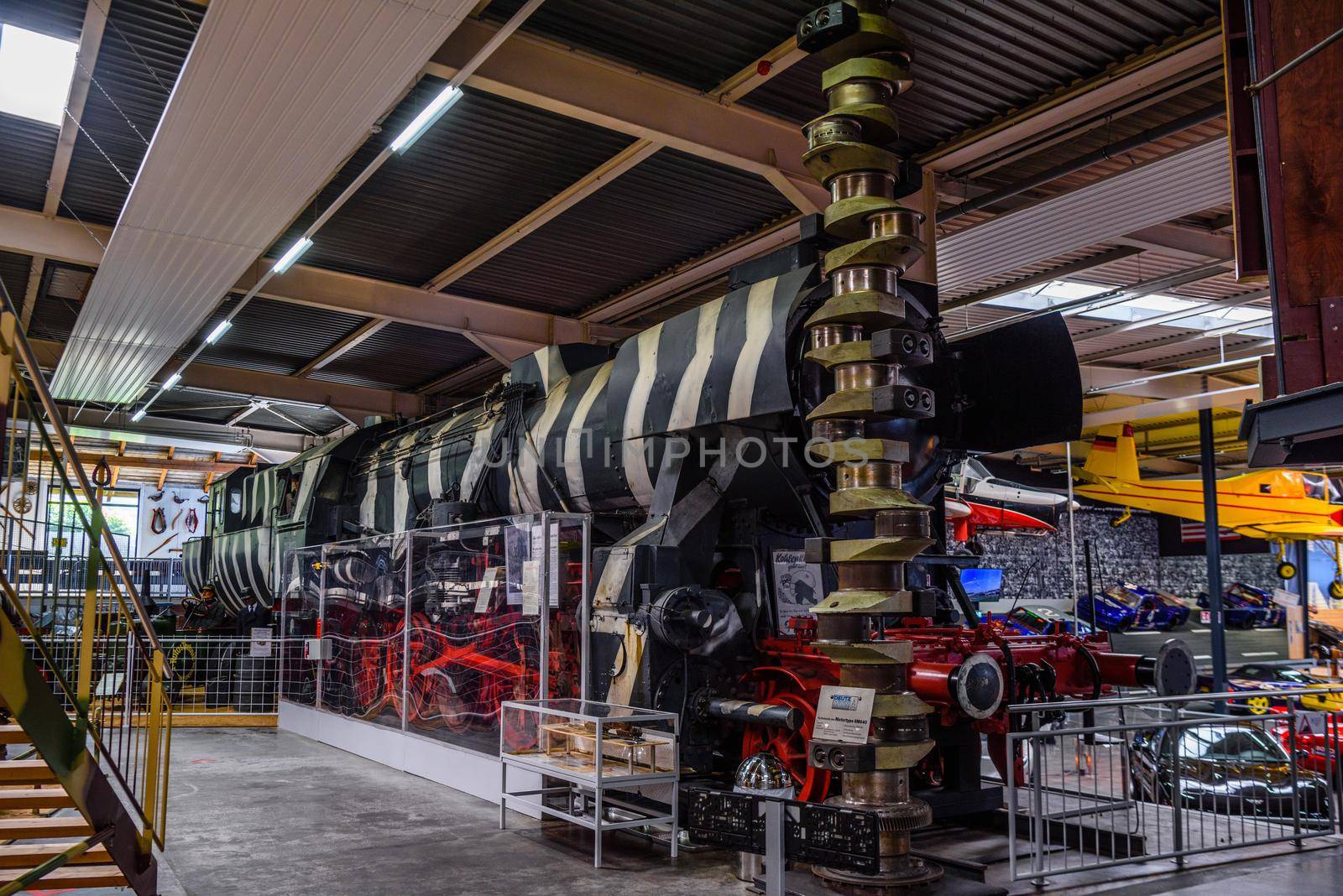 SINSHEIM, GERMANY - MAI 2022: black red antique retro steam locomotive.
