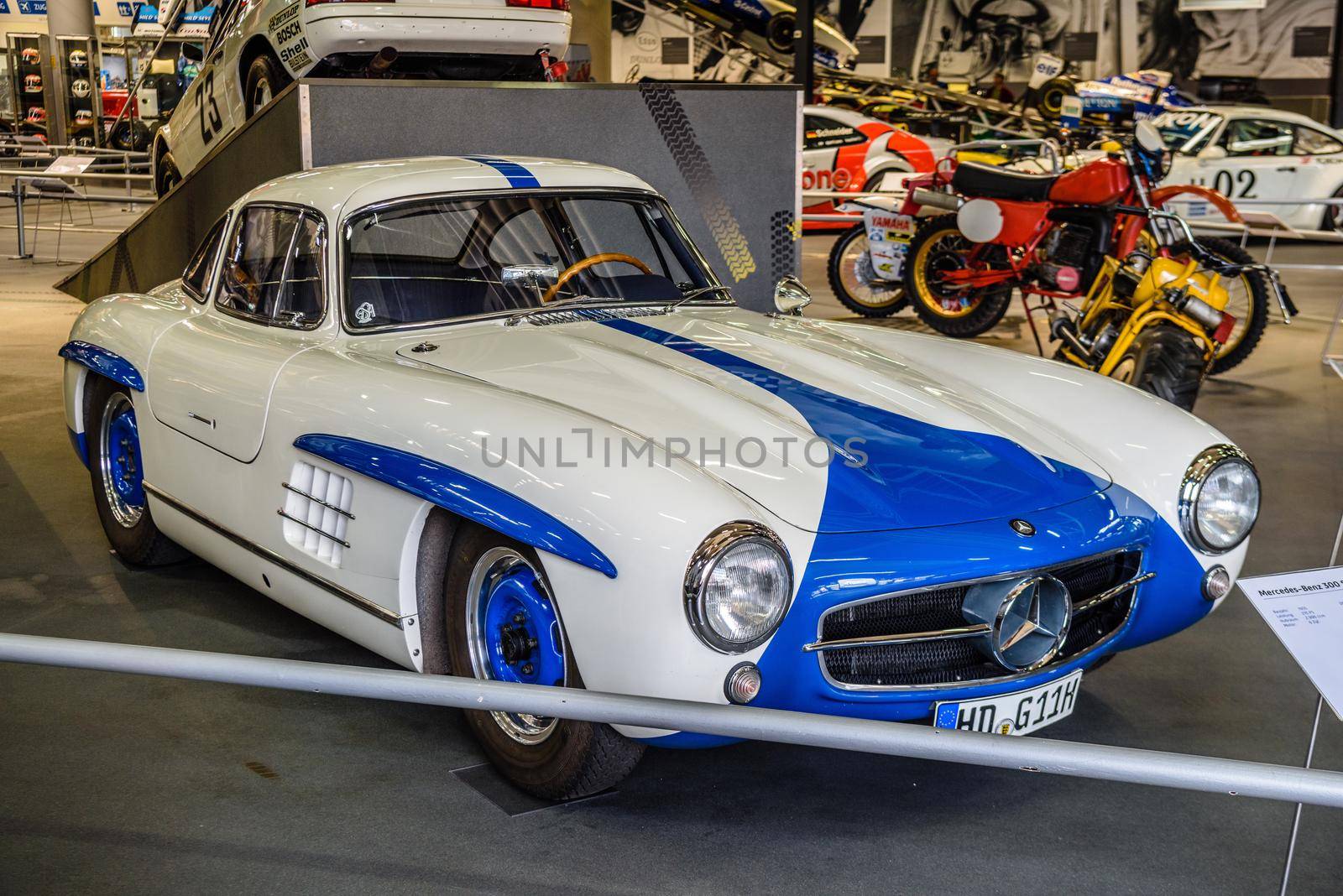 SINSHEIM, GERMANY - MAI 2022: white blue Mercedes-Benz 300 SL gullwinged coupe by Eagle2308