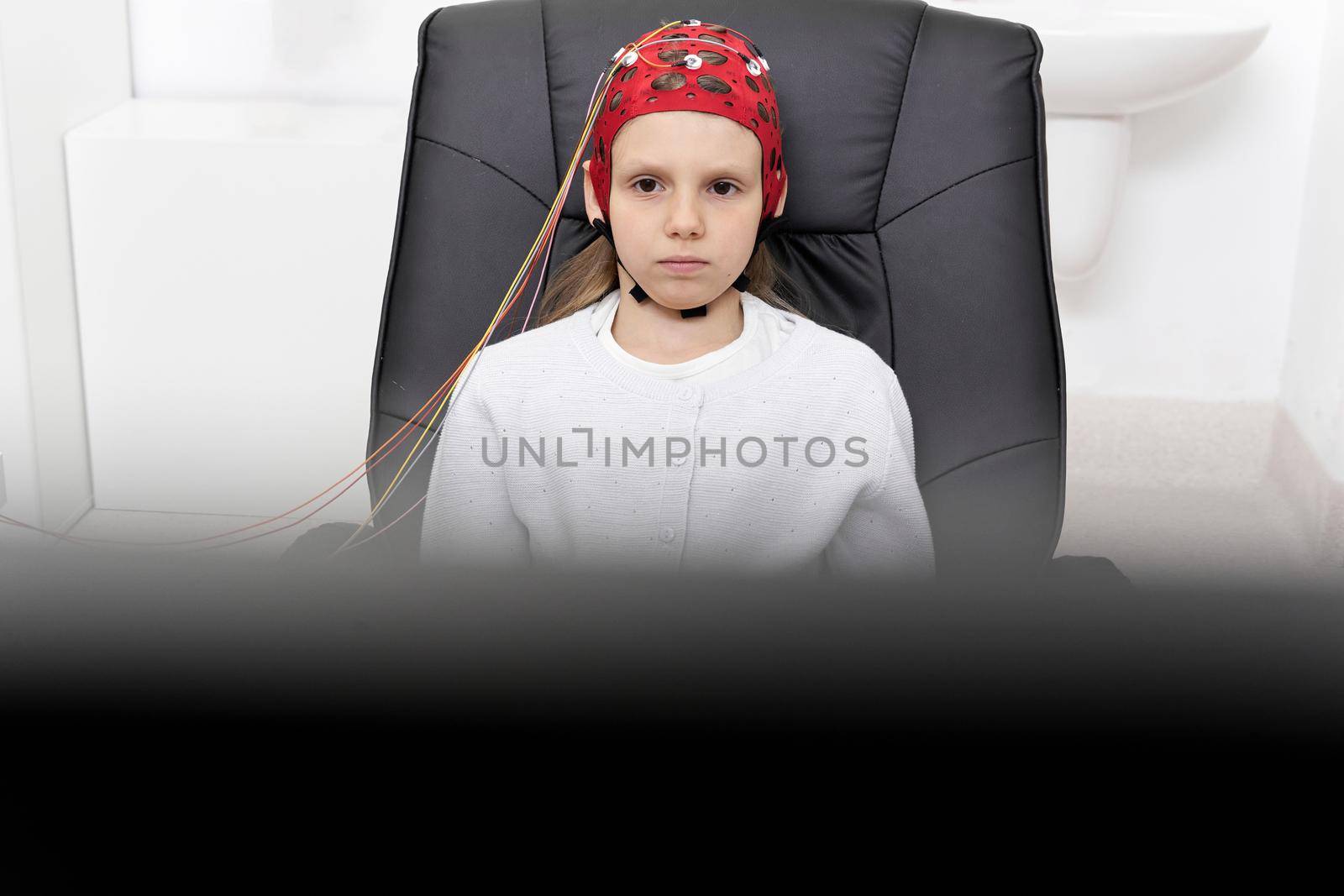 Patient looking to a screen during a biofeedback session by WesternExoticStockers