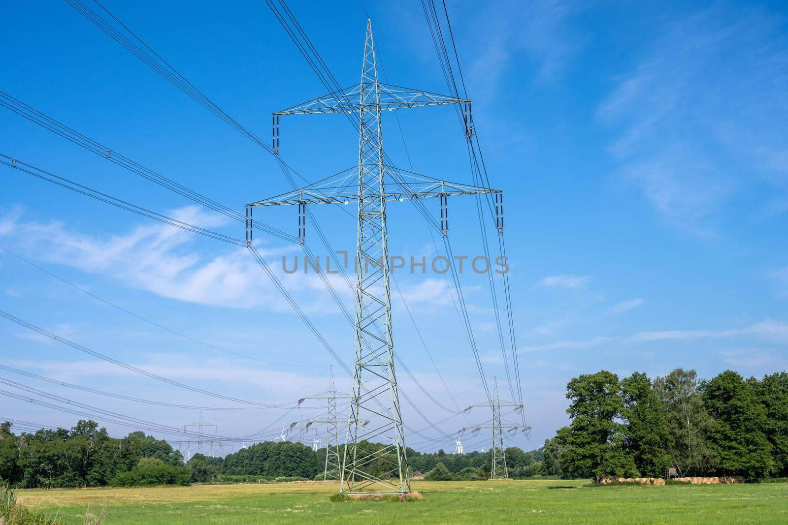 Electric power lines with a steel pylon seen in Germany