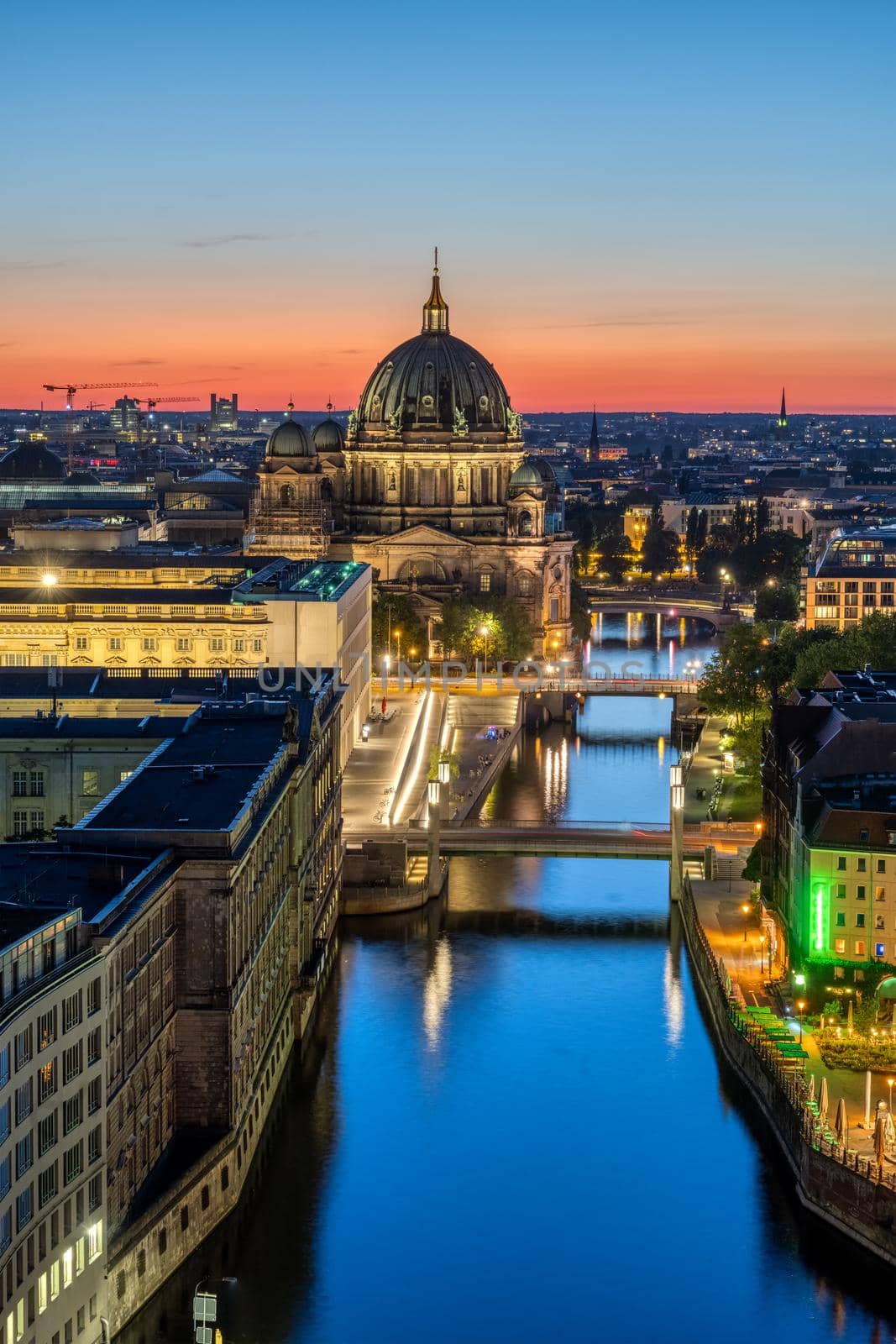 The river Spree in Berlin at night with the cathedral in the back