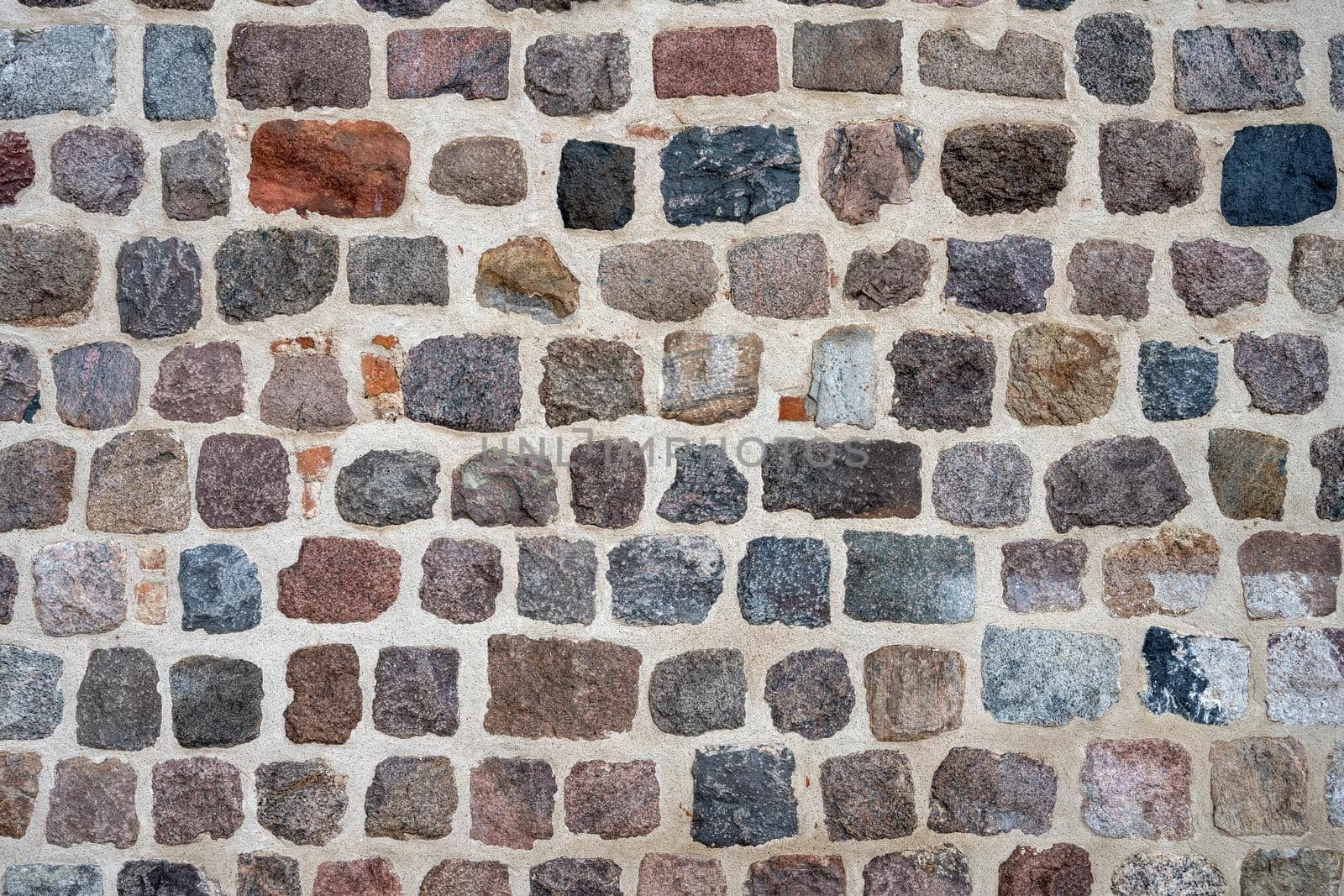 Natural stone wall of an old building by elxeneize