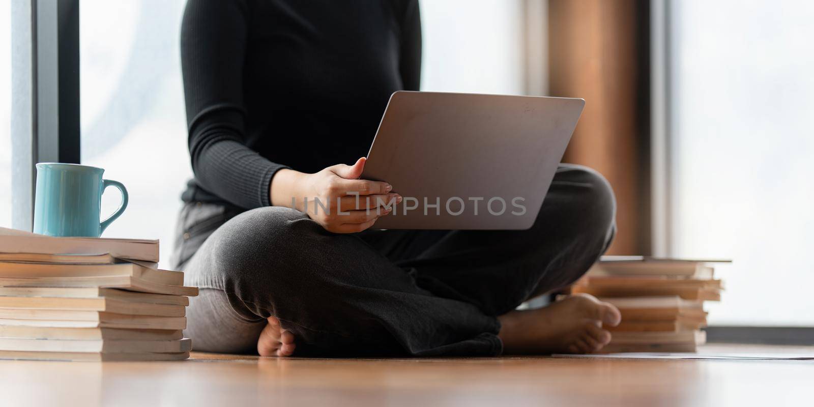 Young woman with working online on laptop computer. studying or working from home online concept