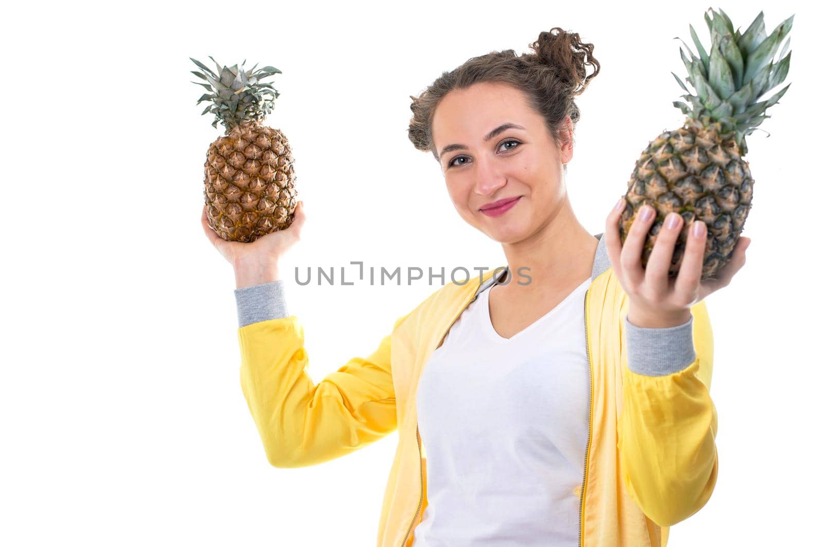 beautiful young woman with pineapple, isolated on white by aprilphoto