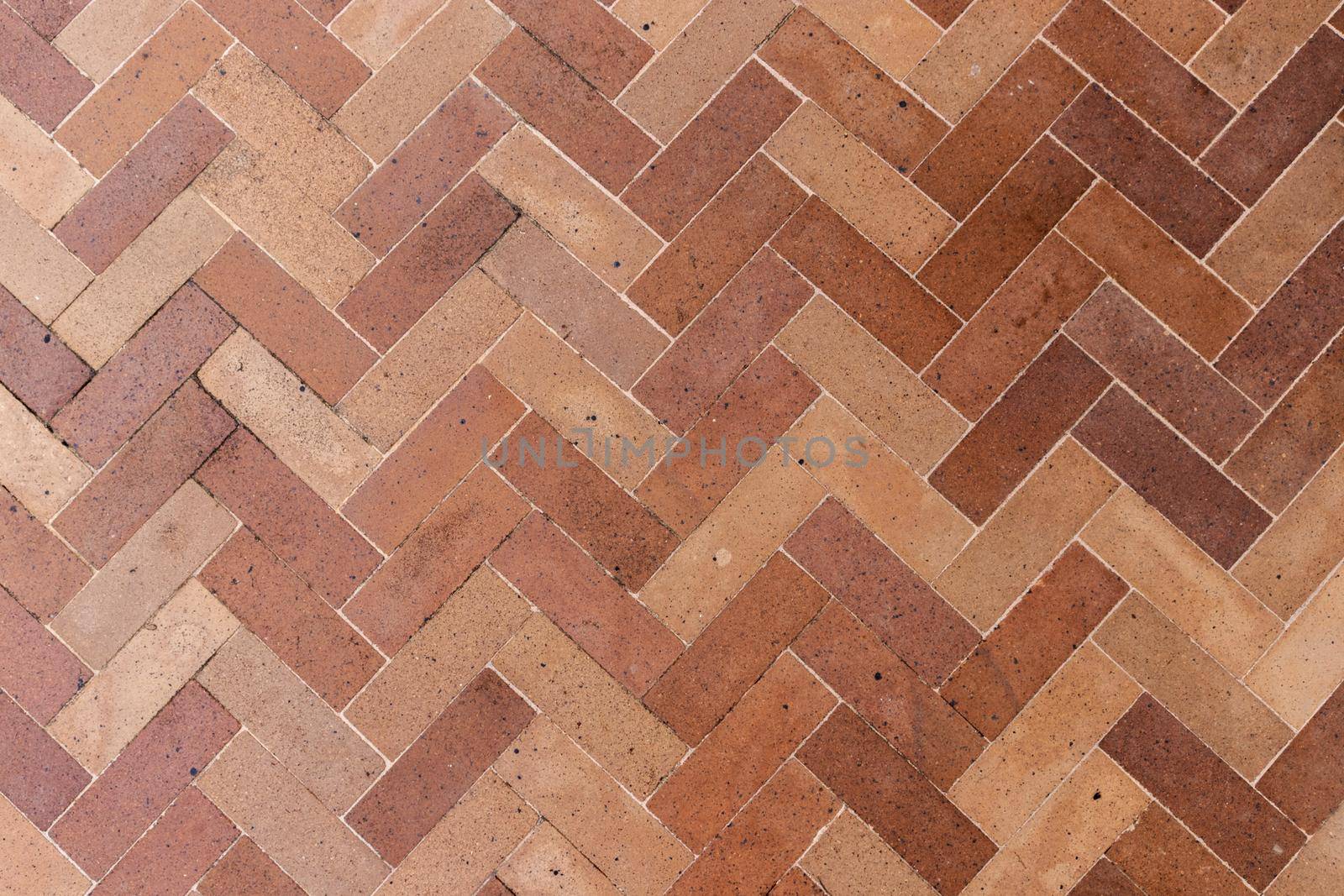 Brown brick floor vintage texture background. by kaisorn