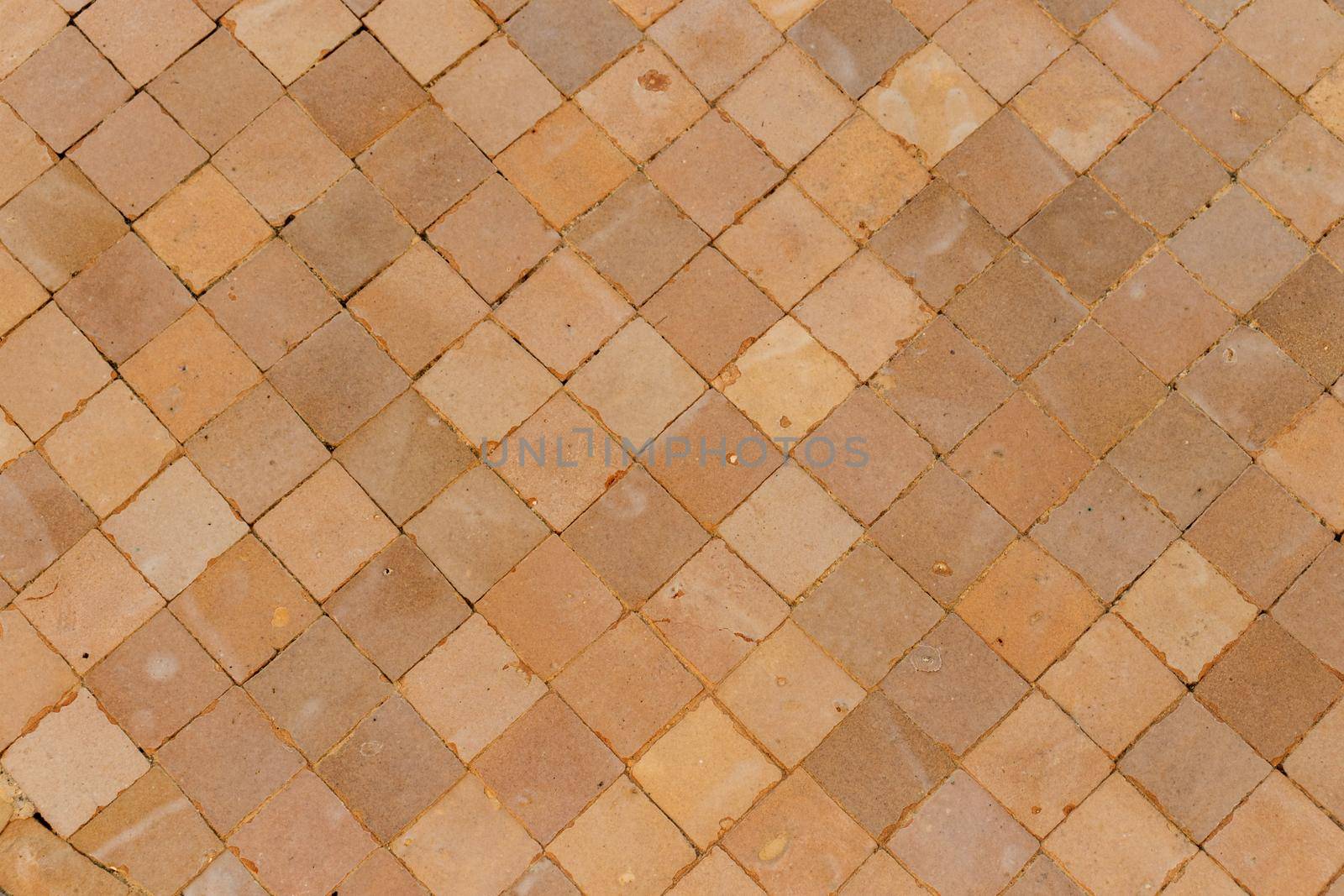 Brown brick floor vintage texture background. by kaisorn